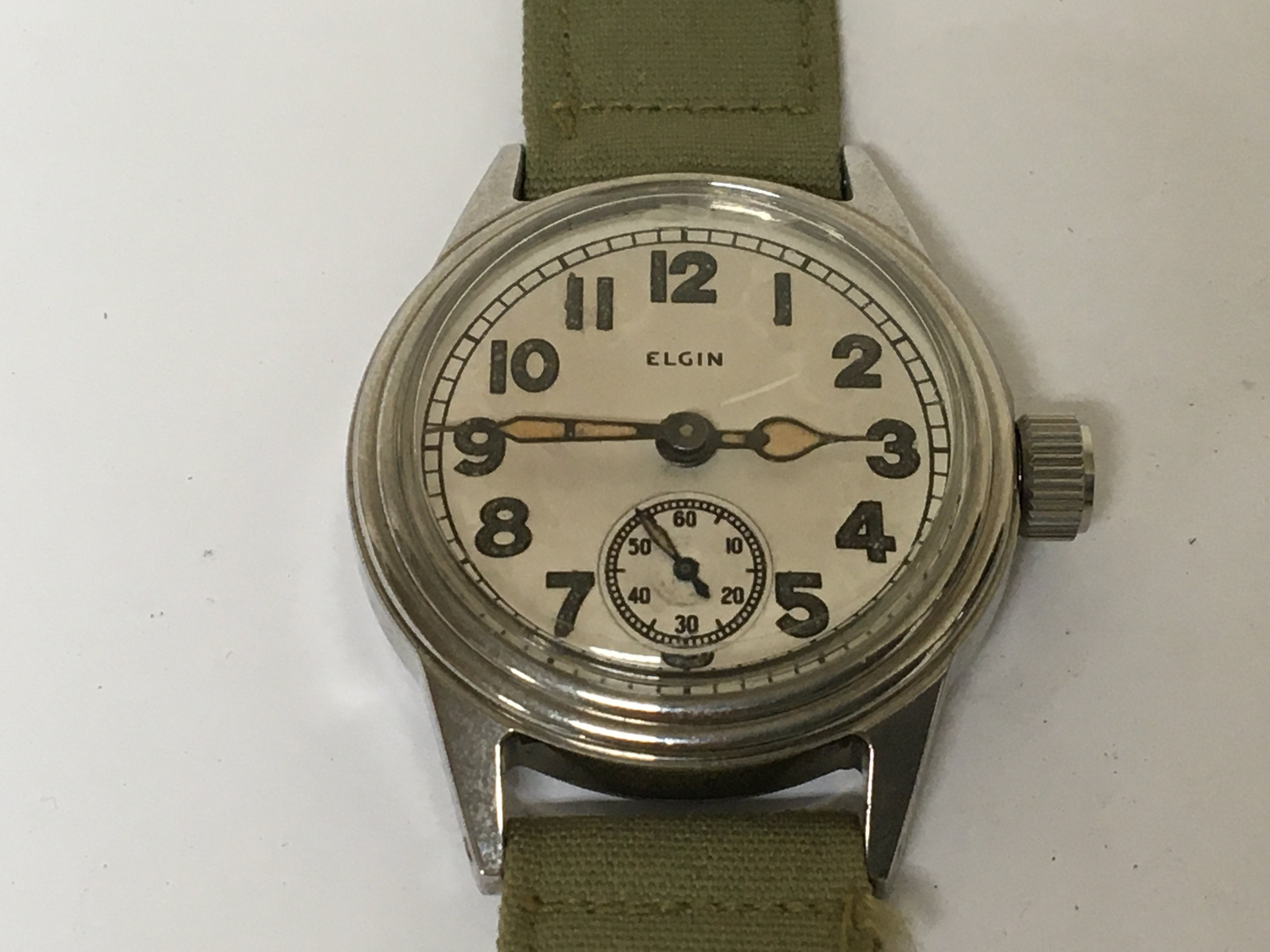 A Military watch Elgin Type A-11 serial number AF3 the dial with second subsidiary dial seen working.