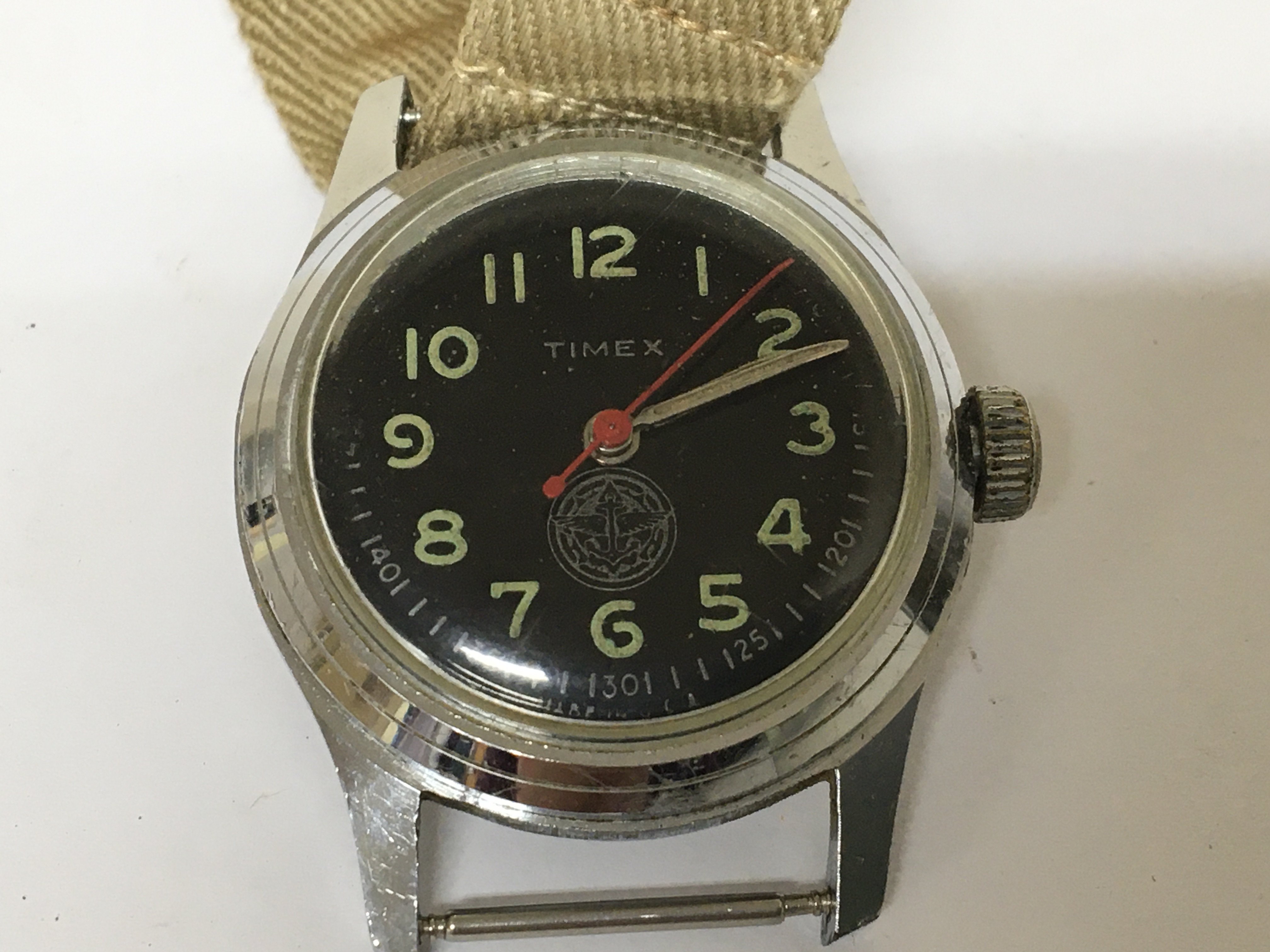 A Military Timex watch black dial red second hand not seen working.