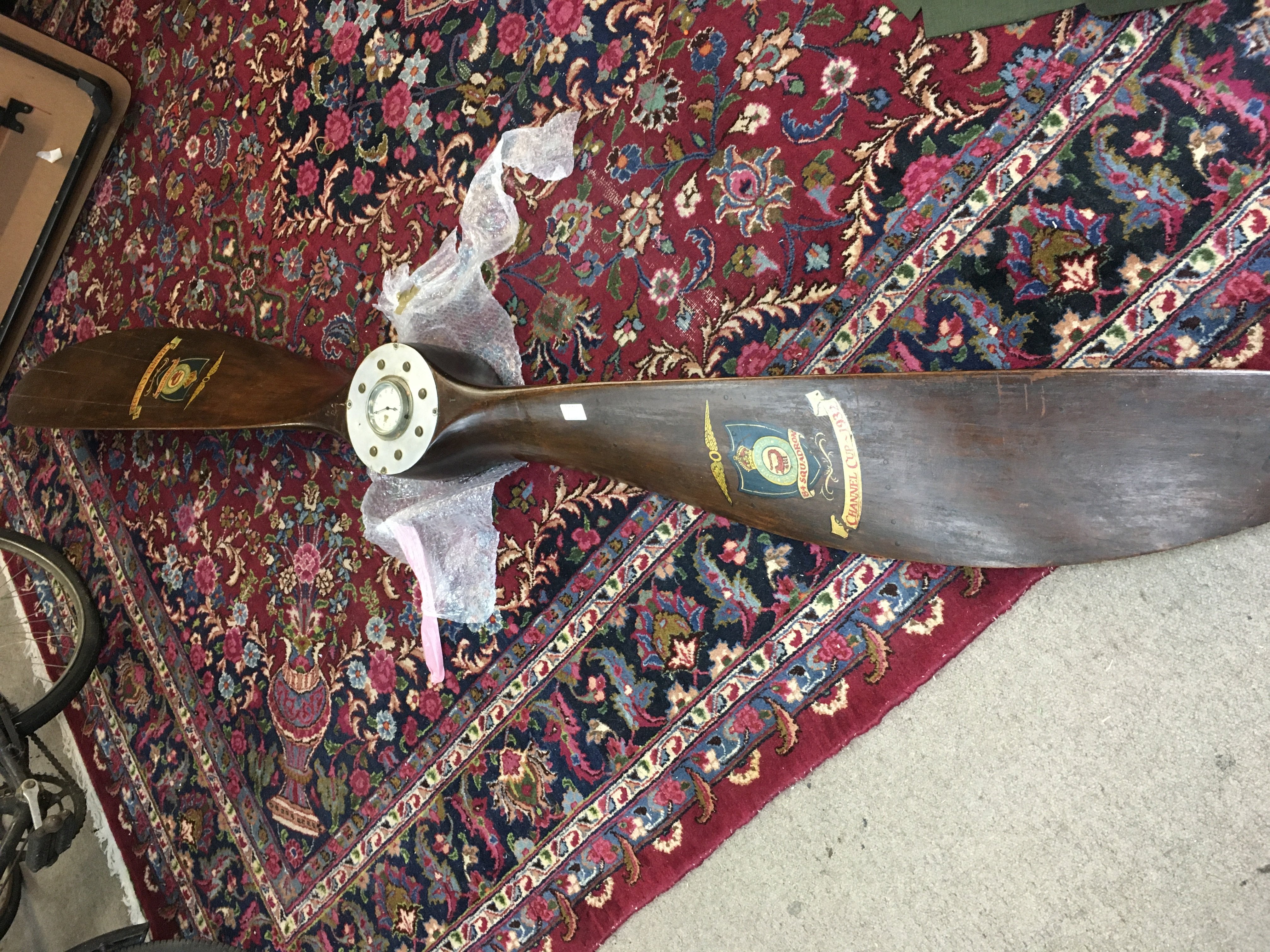 A 2 blade WWI era wooden propeller with possible association to the 84 squadron with various markings with mounting bracket. Approx Length 257cm long.