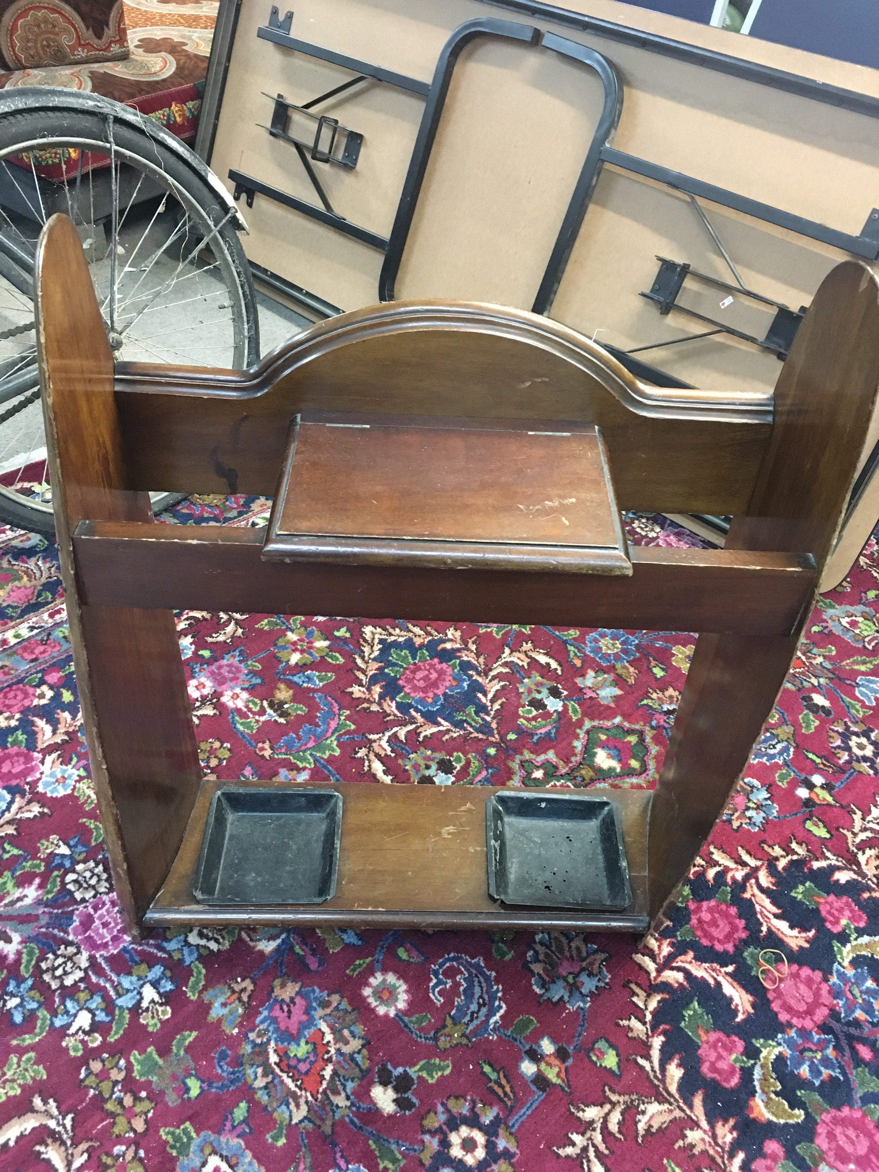 A stick and umbrella stand made from WWI era propeller blades with drop trays and glove box. Approx measurements 60x82cm.