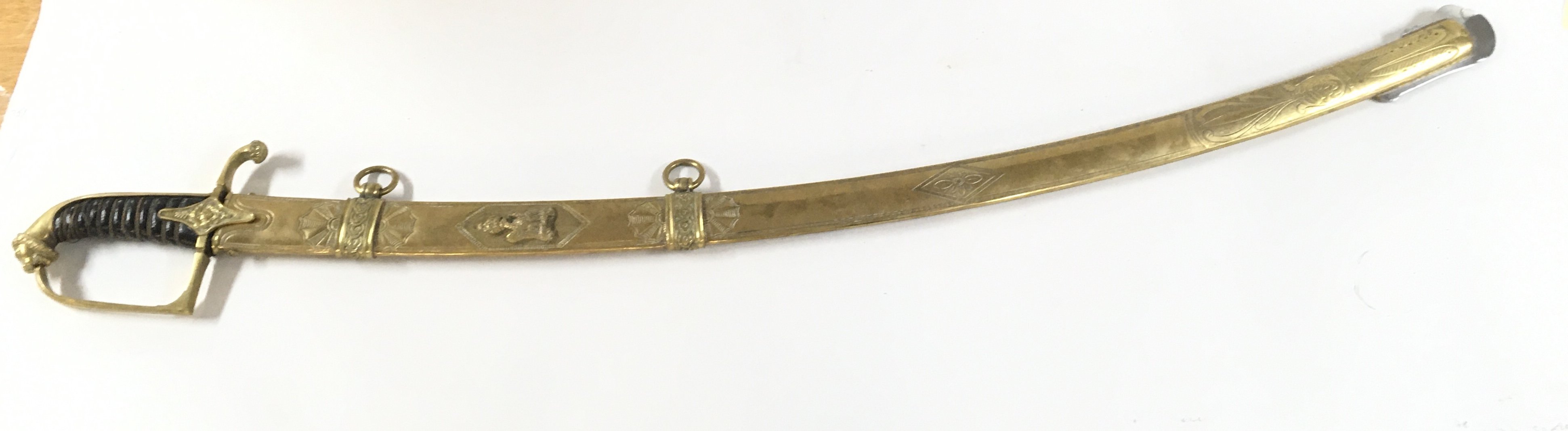 A Napoleonic Imperial Guard Light Cavalry Saber with a blued-gilt blade . Total length approximately 105cm , blade 84cm long. This lot cannot be posted