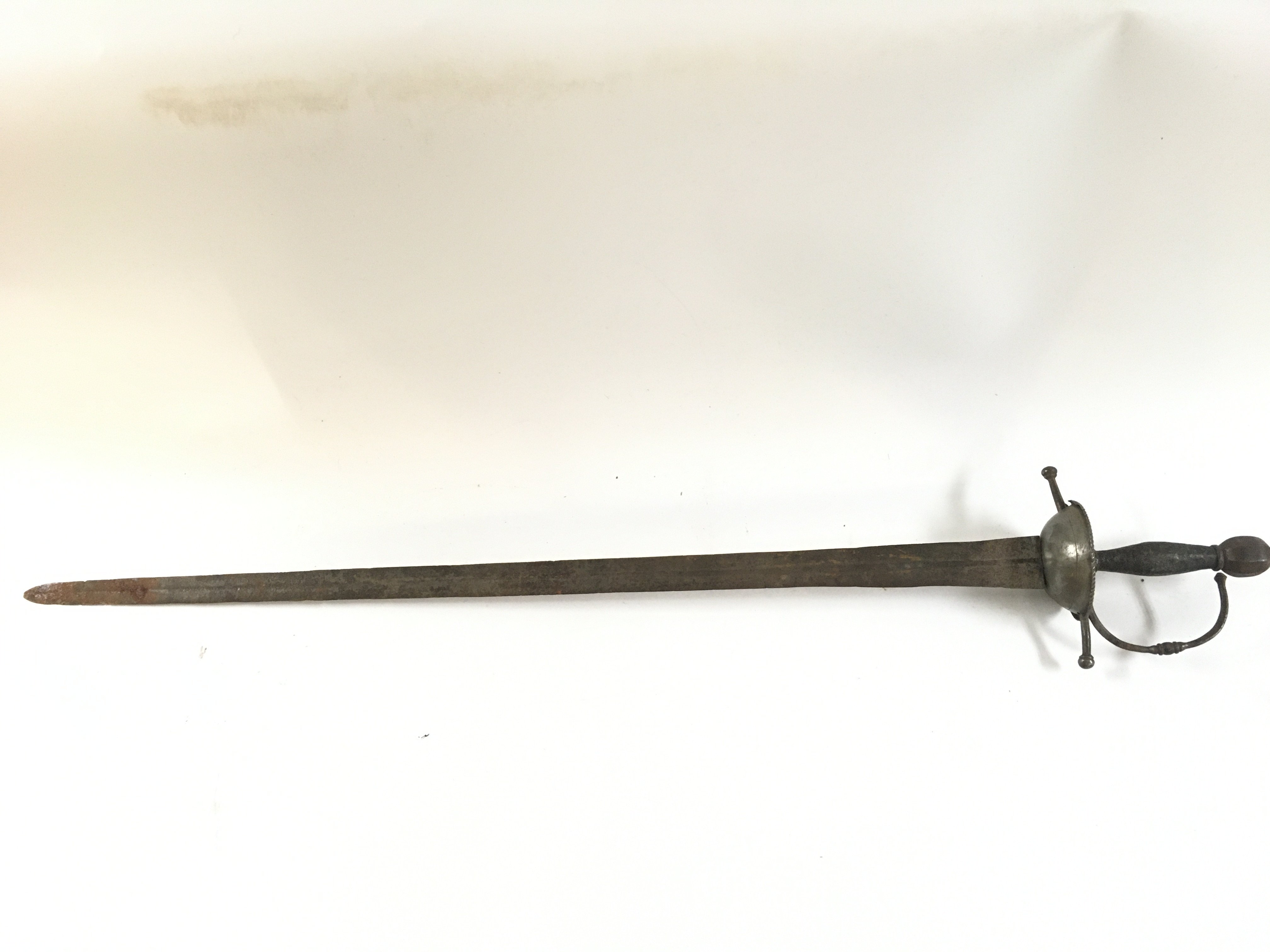 An 18th-19th century Italian rapier, blade 66cm long total length 82cm. This lot cannot be posted