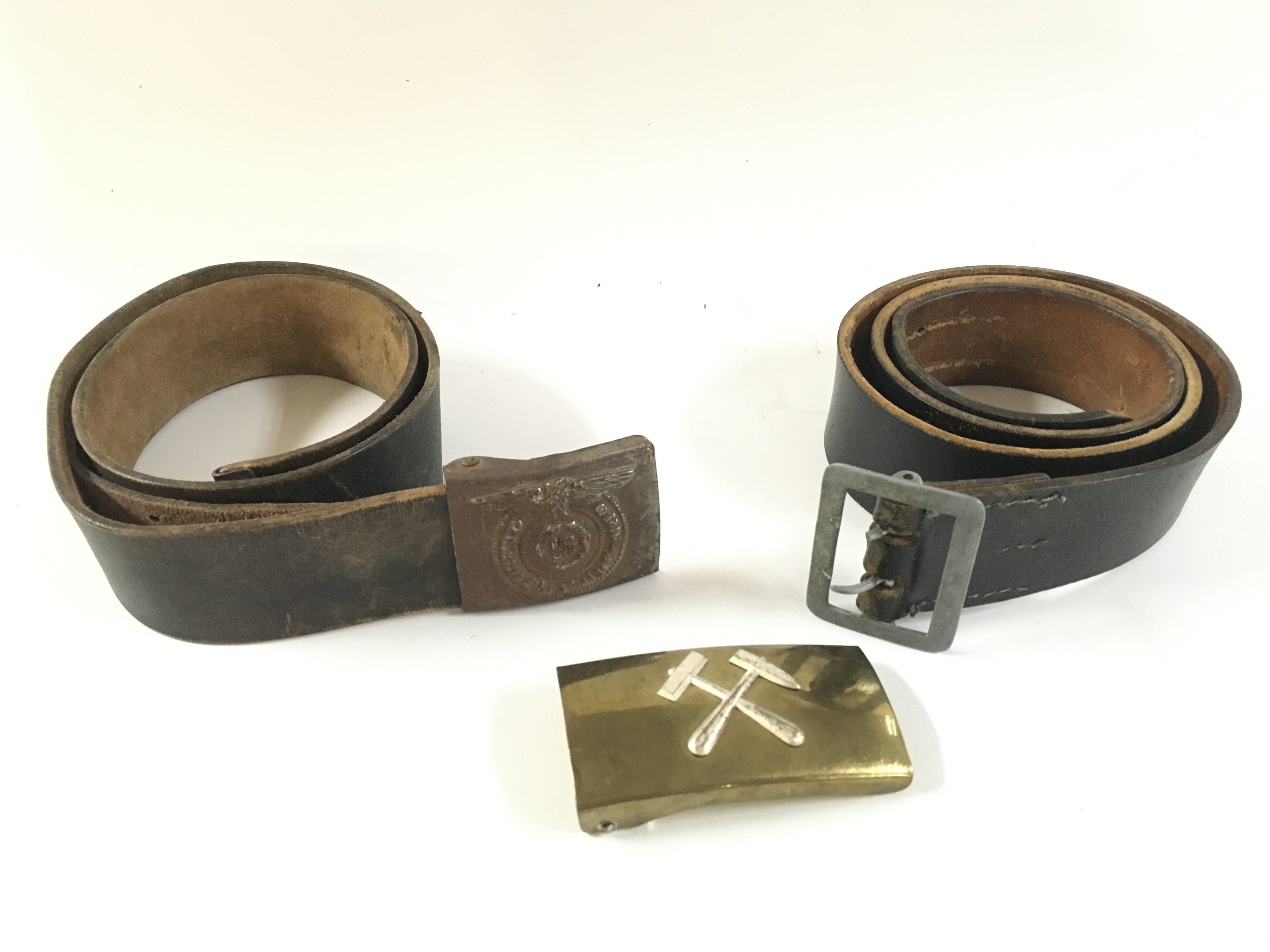 Two German Third Reich officers belts and a German Miners belt buckle . Postage category B