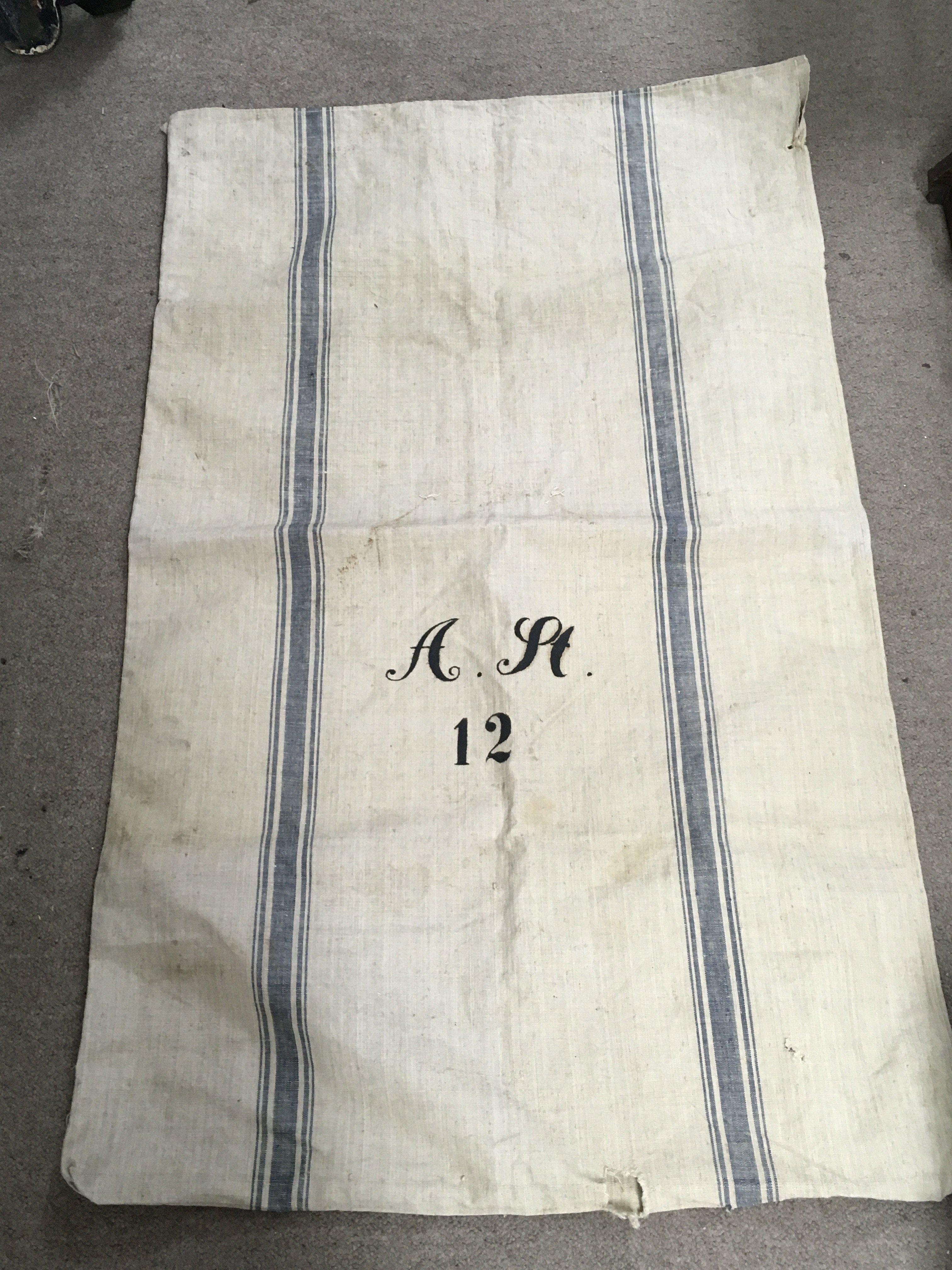 A German Third Reich grain sack, dated 1943. dimensions 118x71cm . Postage category B