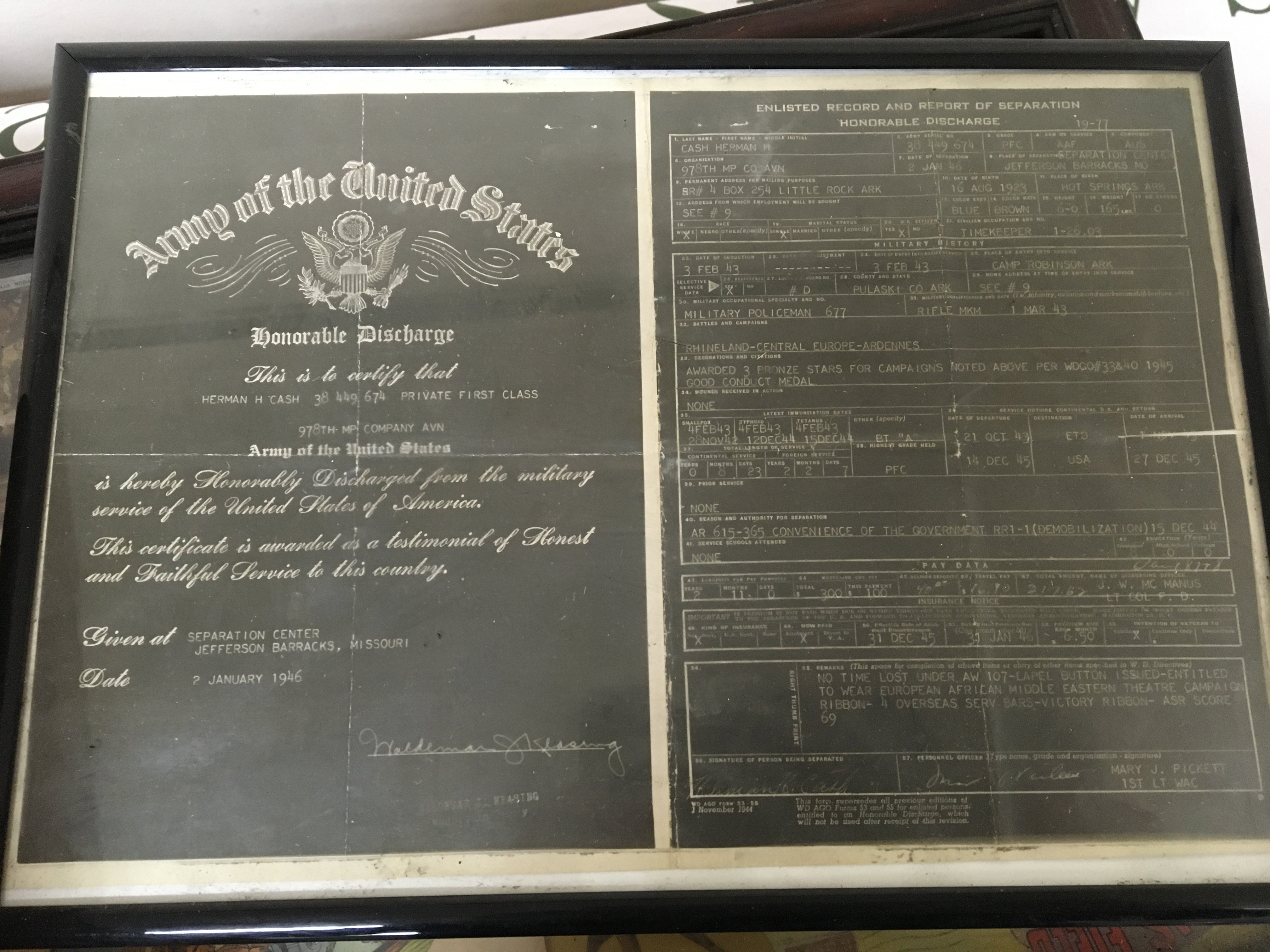 A collection of American II world war ephemera product packaging and other American military related items in fitted cases and frames.