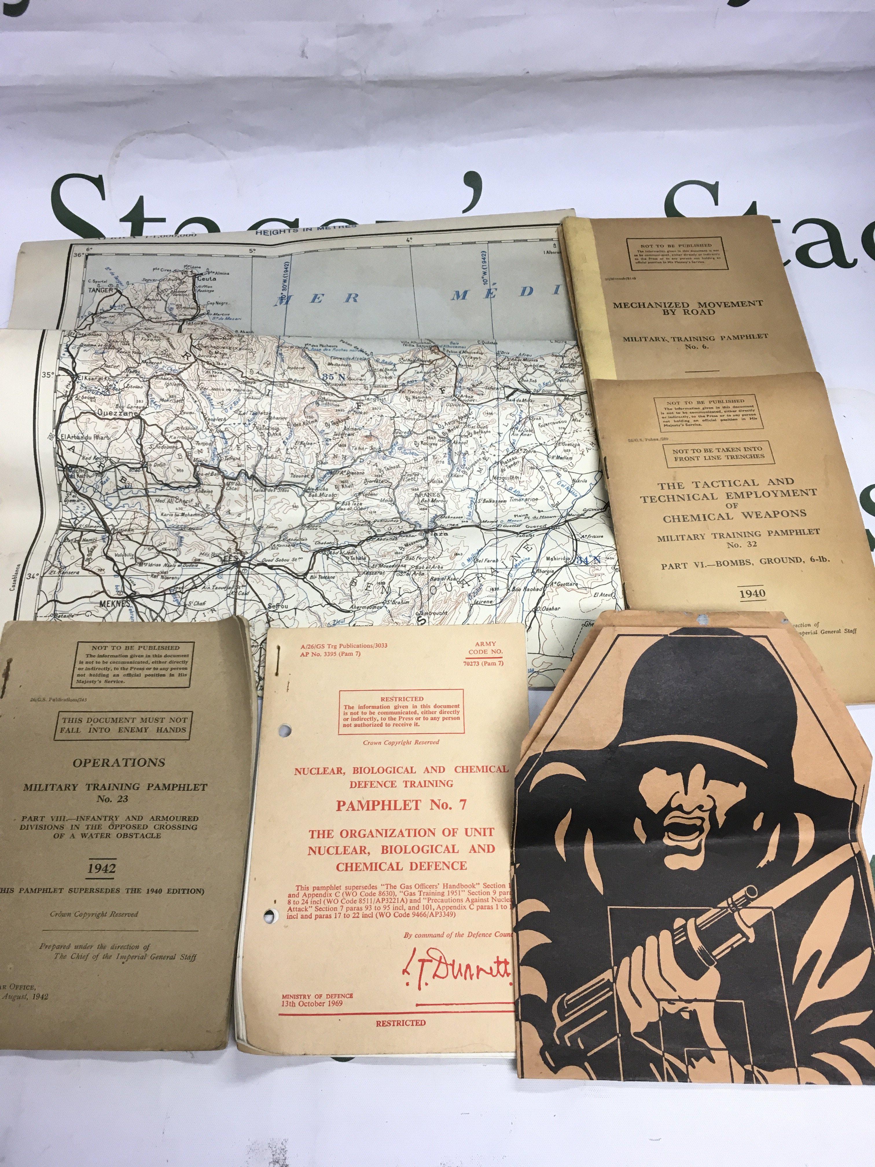 1930-40 military training books and maps. Shipping category A.