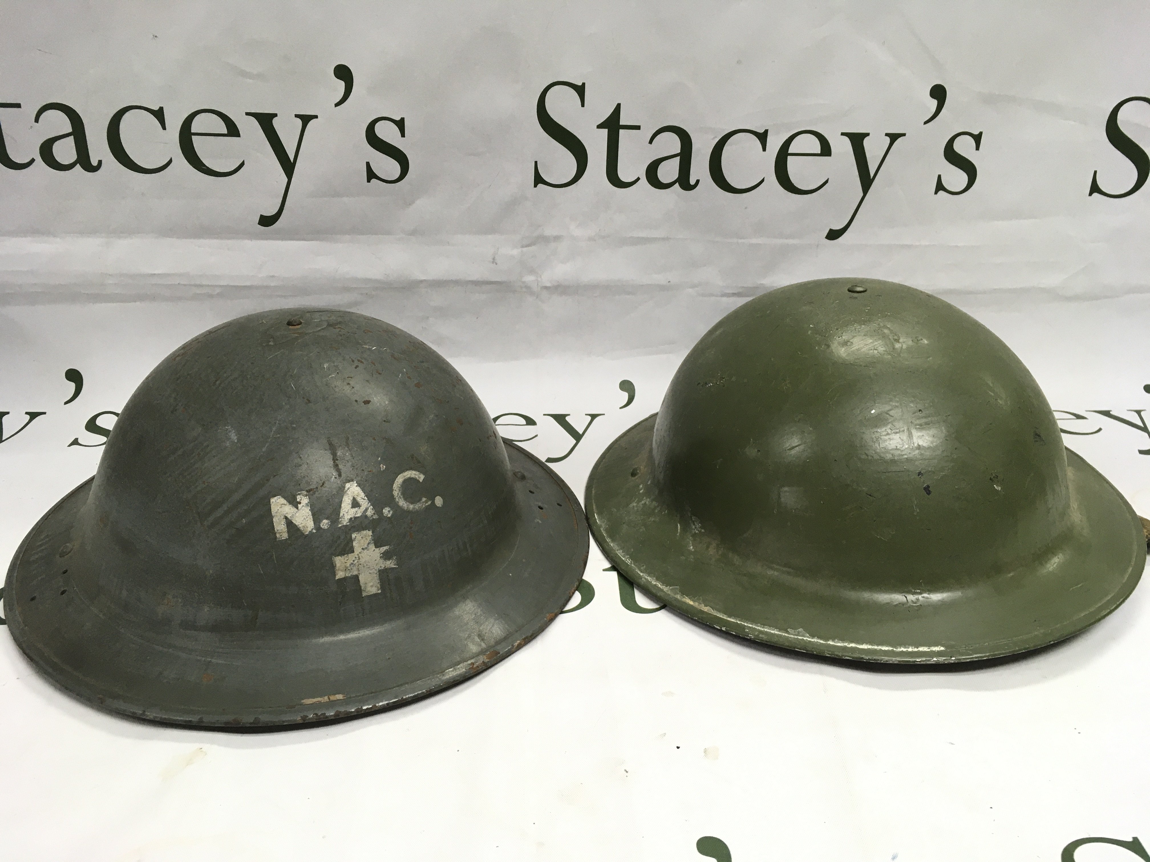 Two WW2 military helmets. Shipping category C.