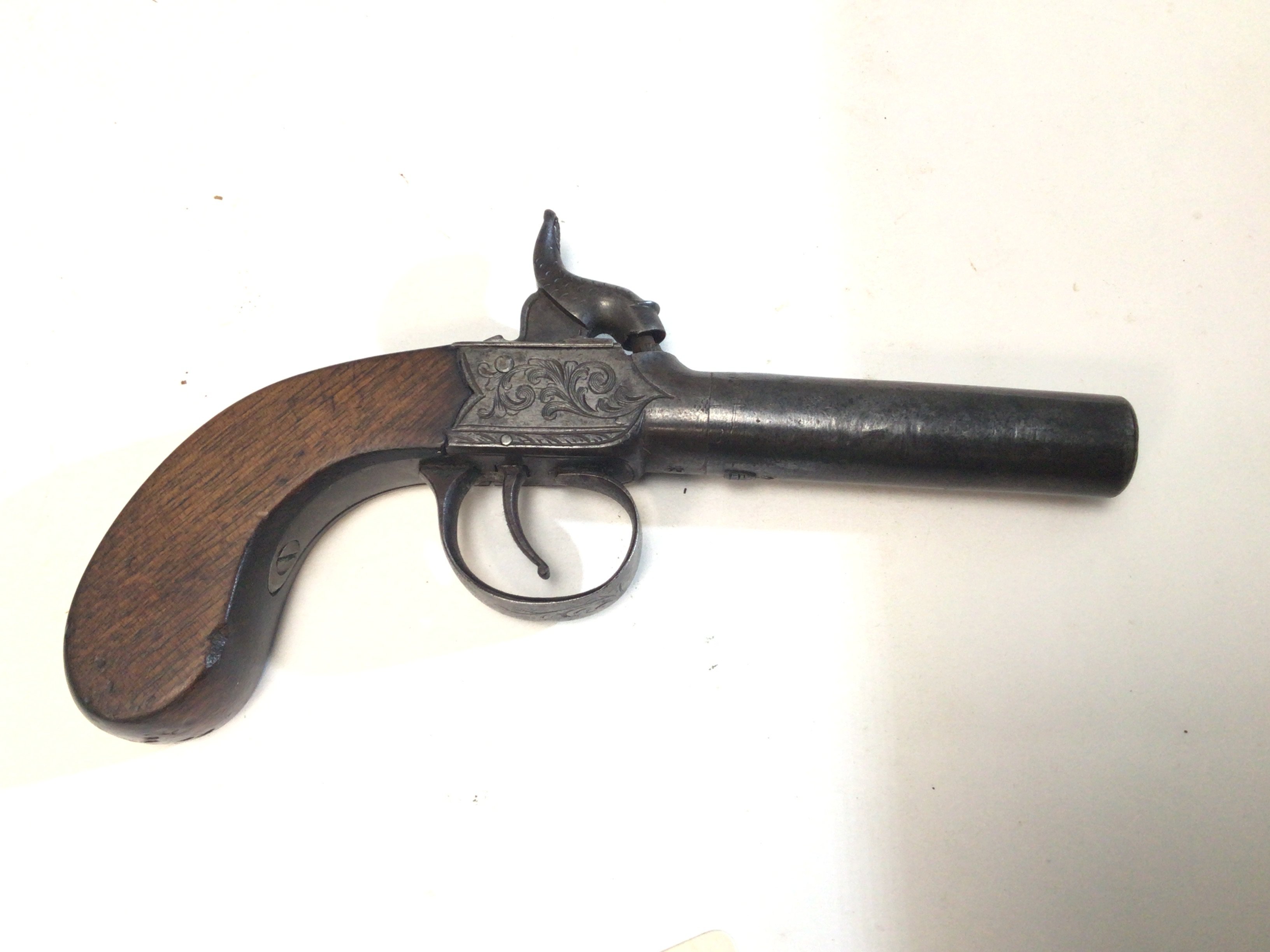 A 19th century slab sided Percussion pistol engraved action maker Strowse Brompton