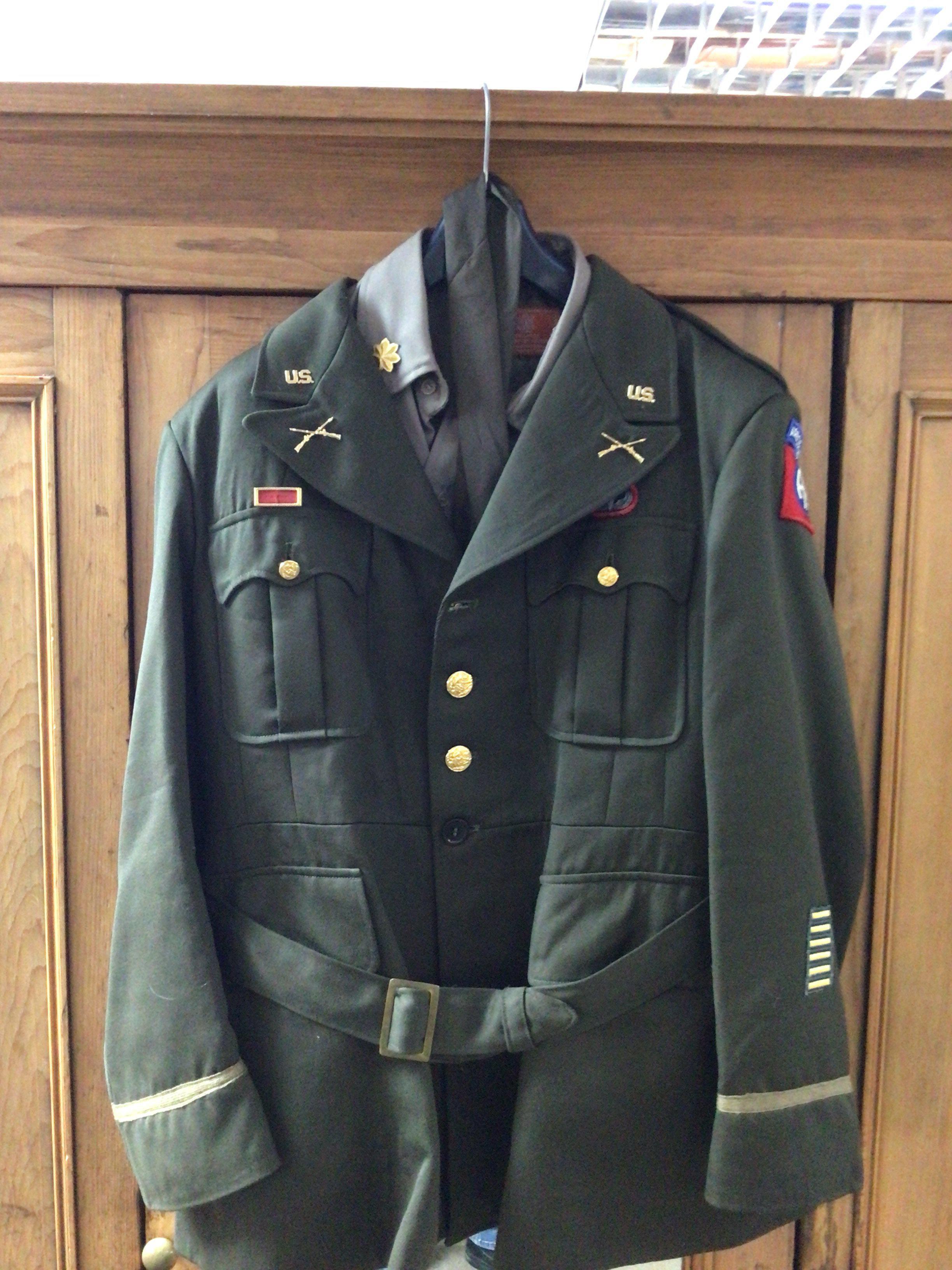 An American II world war Officers dress jacket with shirt trousers and tie badged US Airborne.