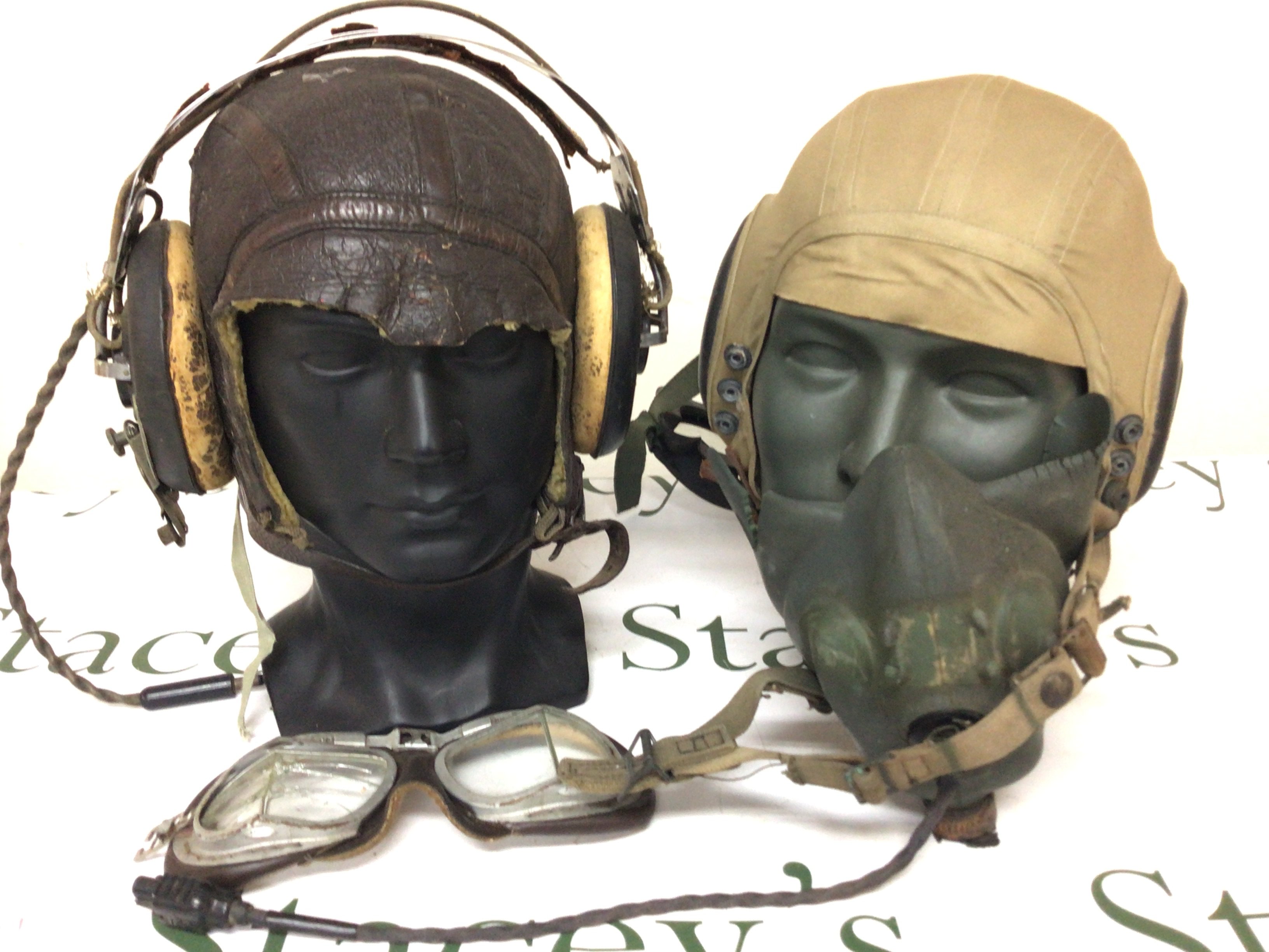 Two American Airforce flying caps with original attachment II world war. and a Military issue rucksack