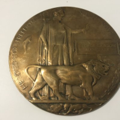 A l World war Memorial plaque The Death Penny posthumously awarded to George Lawson Manclark a Mariner who died on 19th October 1917 whilst on the SS Britannia.