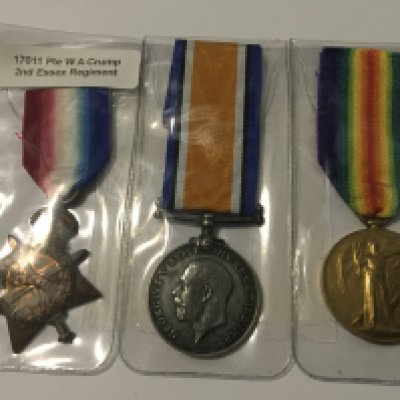 Three I world war medals including 1914/15 star awarded to 17011 PTE W A Crump 2nd Essex Regiment.