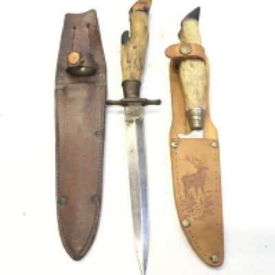 A Vintage Hunting Knife possibly the steel blade with maker William Hodgers England with a deer hoof grip and one other conforming hunting knife (2)