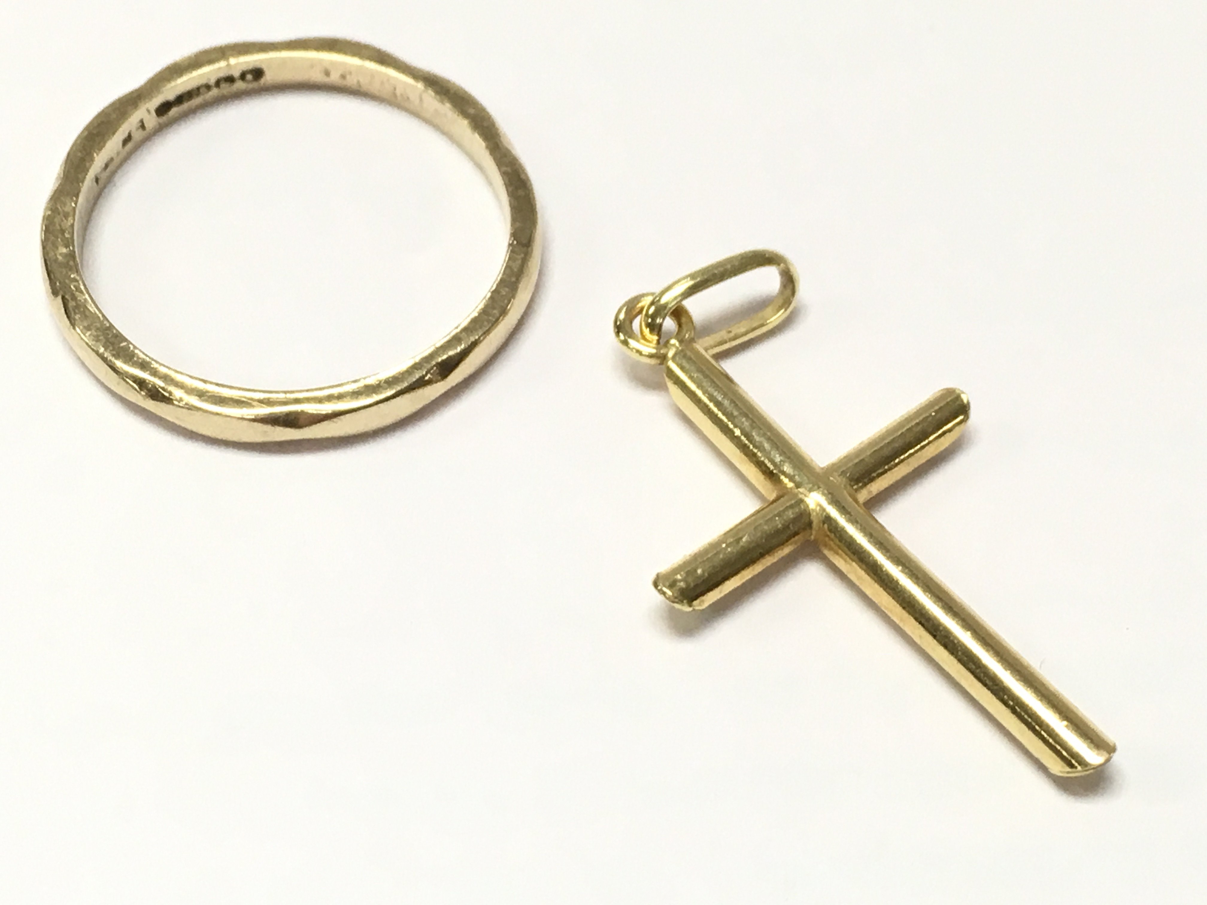 9ct Gold cross pendant and a 9ct gold ring , total weight 2.5g. Postage category A
