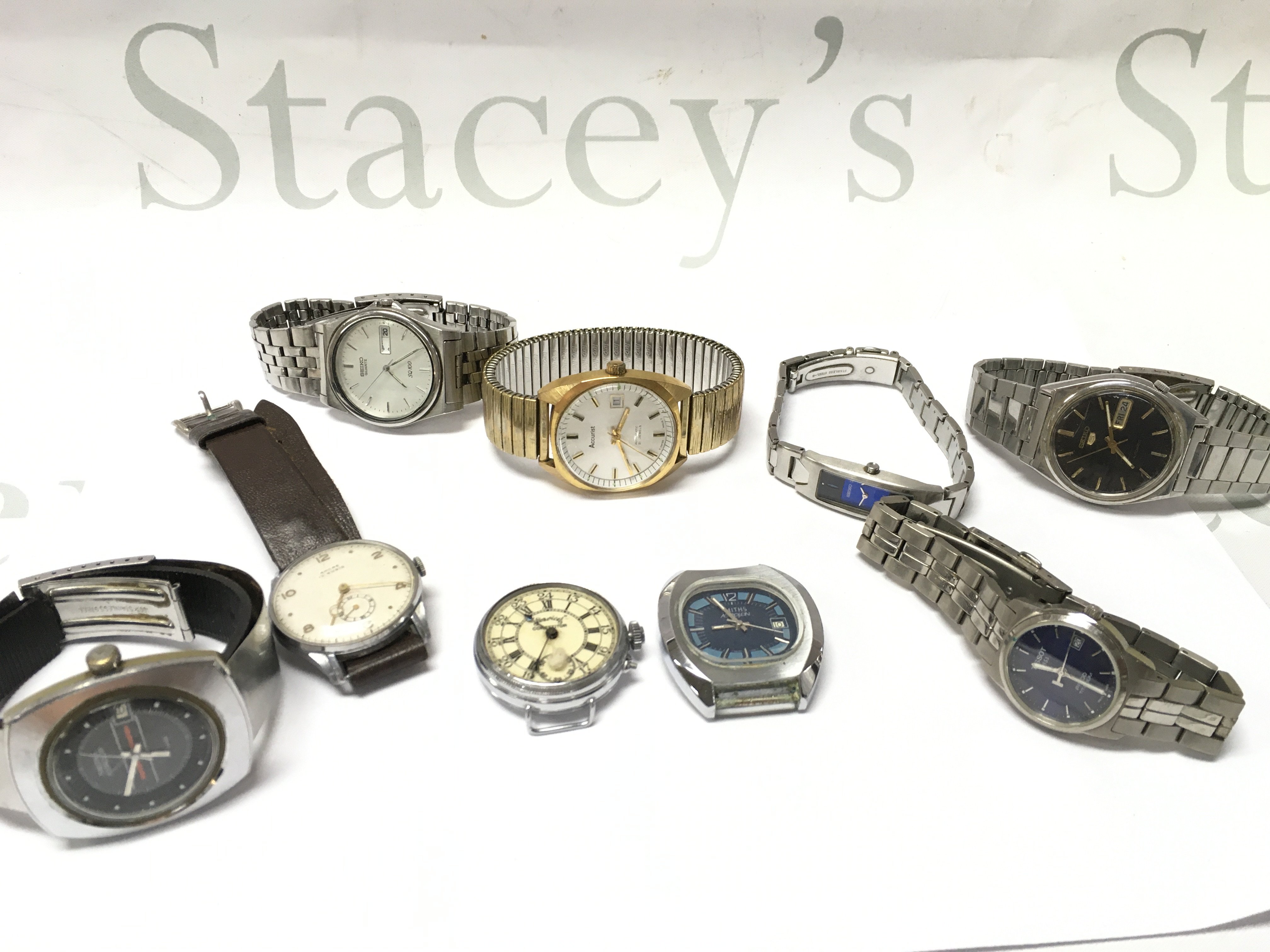 A collection of vintage mens watches to include Seiko, Smiths, Tissot , Services