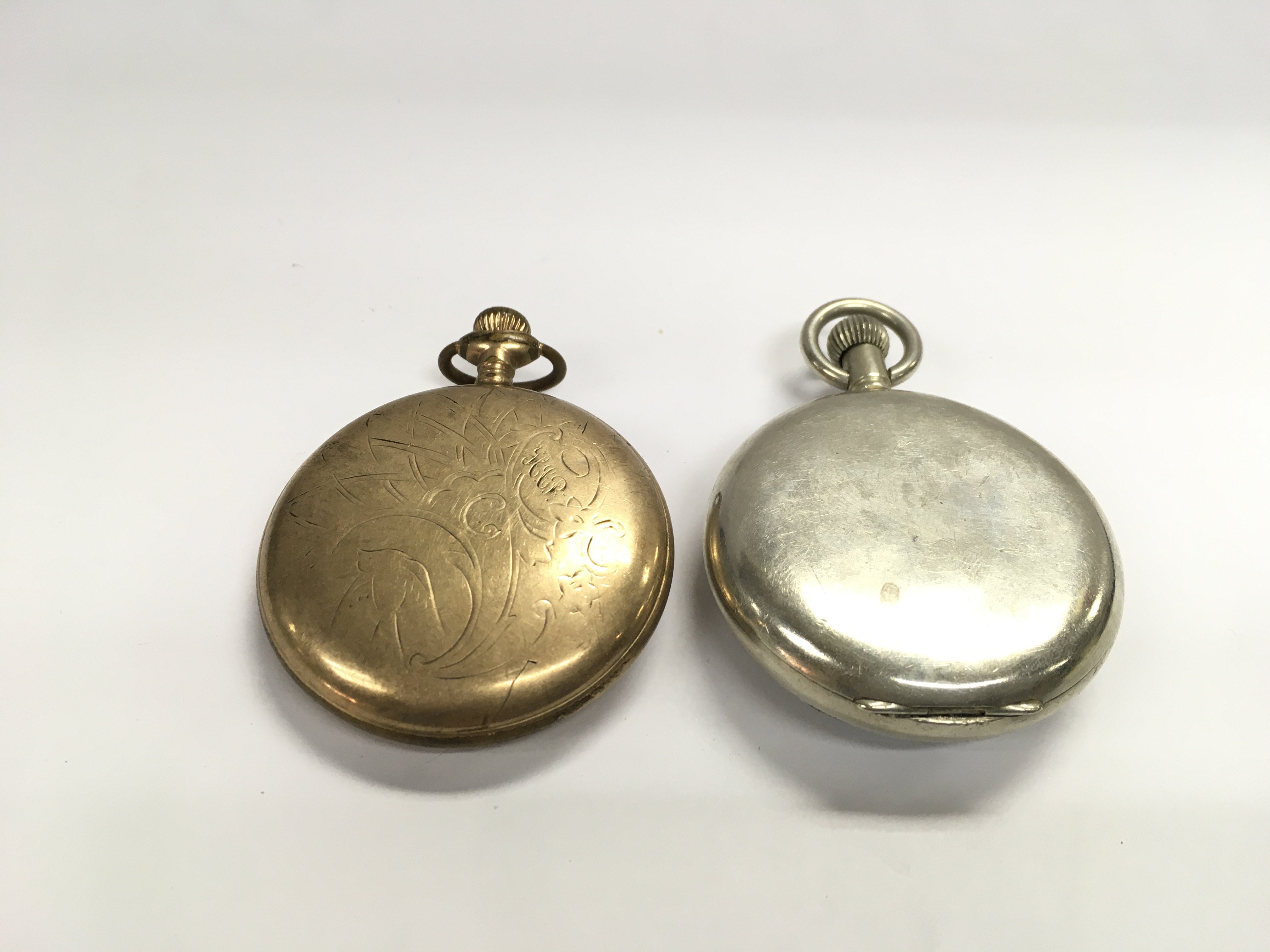 A Ninerva stop watch and one other pocket watch. Not running. NO RESERVE