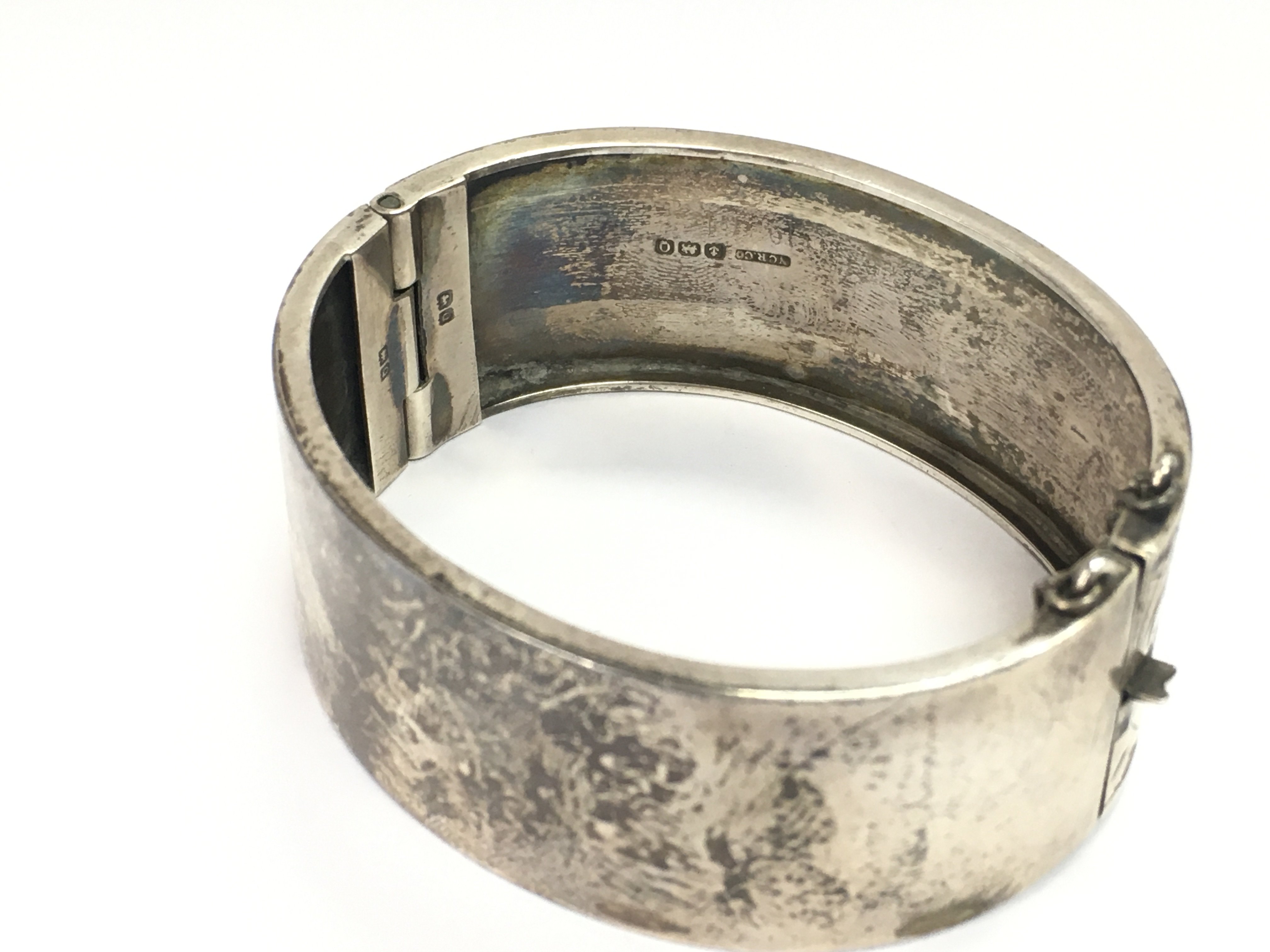 A silver bangle with Birmingham hallmarks 32.61g. NO RESERVE