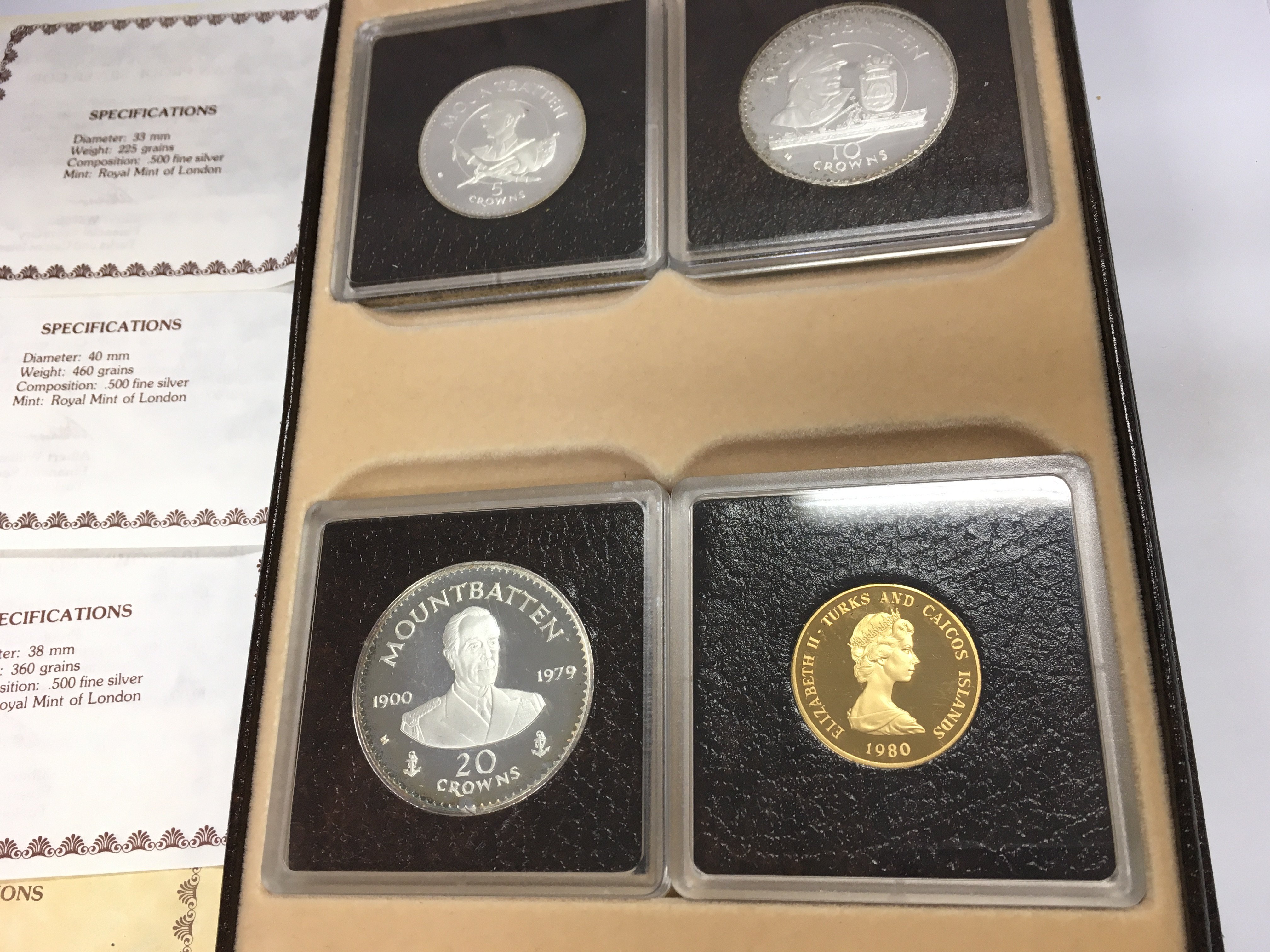 A turks and caicos silver and gold coin set. Includes a approx 13g 12ct gold coin. Postage B