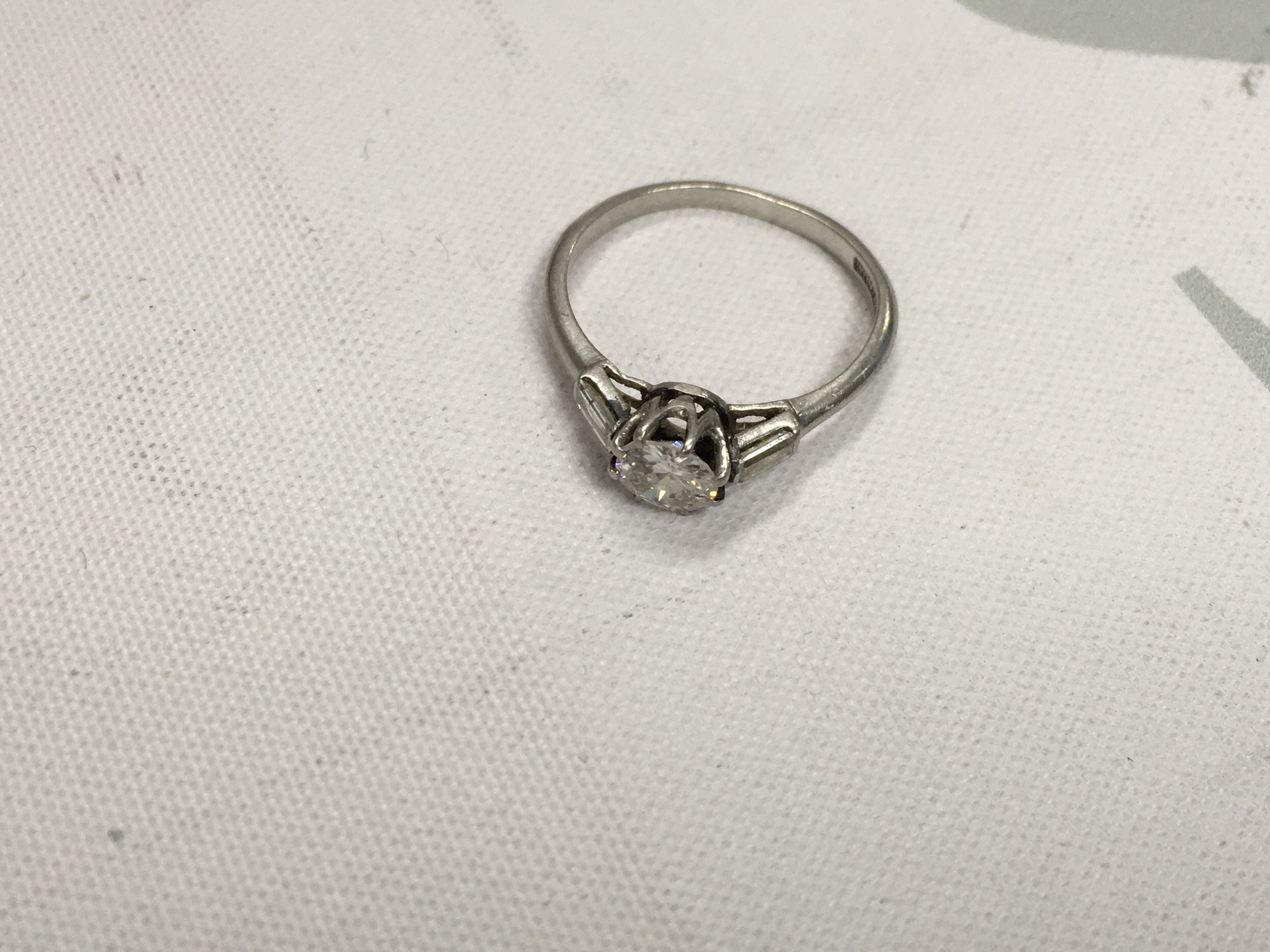 A platinum solitaire ring, approx 0.75cts, size L1/2. Approx weight 2.85 grams.