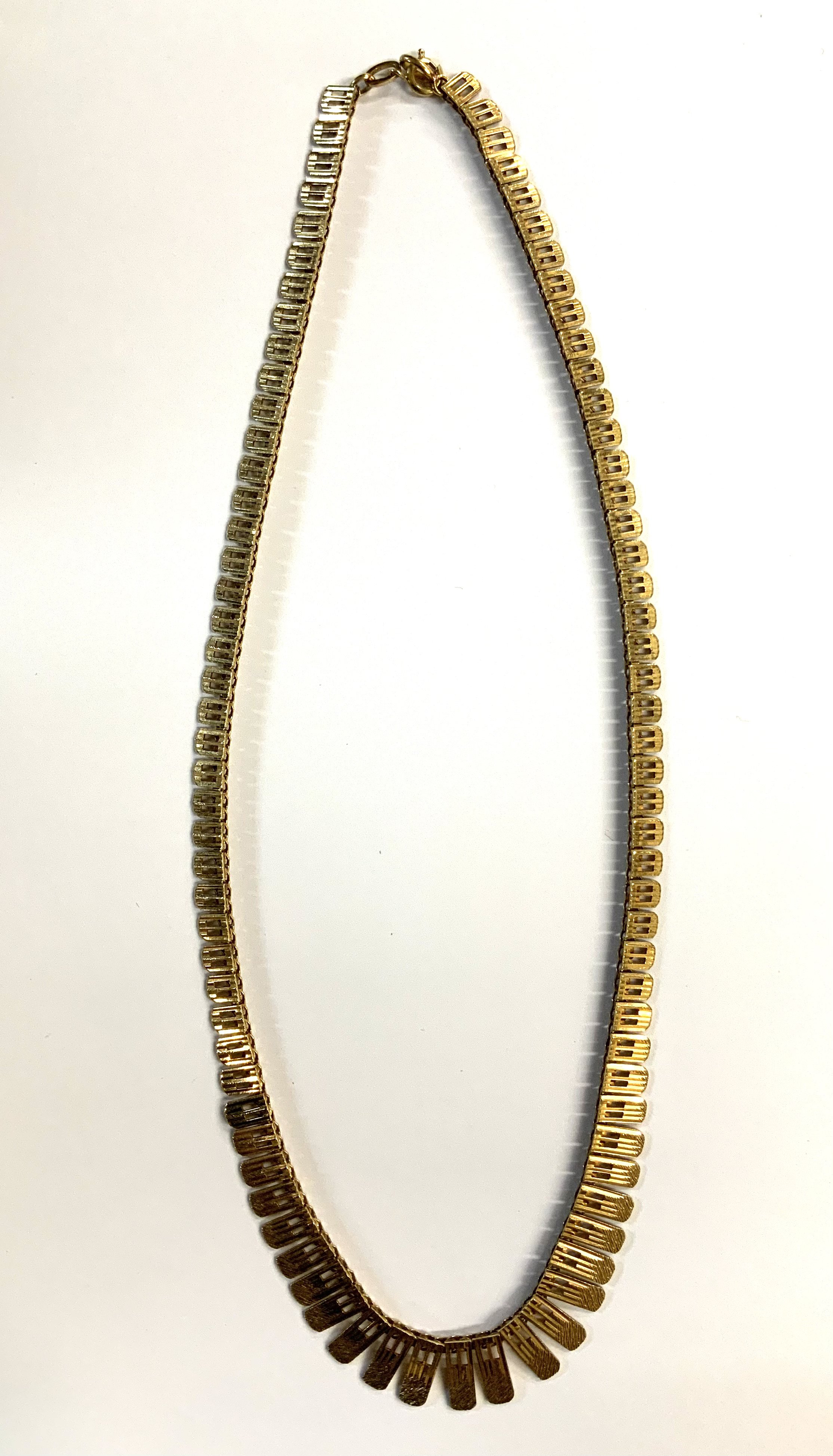 A 9ct gold 1970s design collecrette necklace. (A)