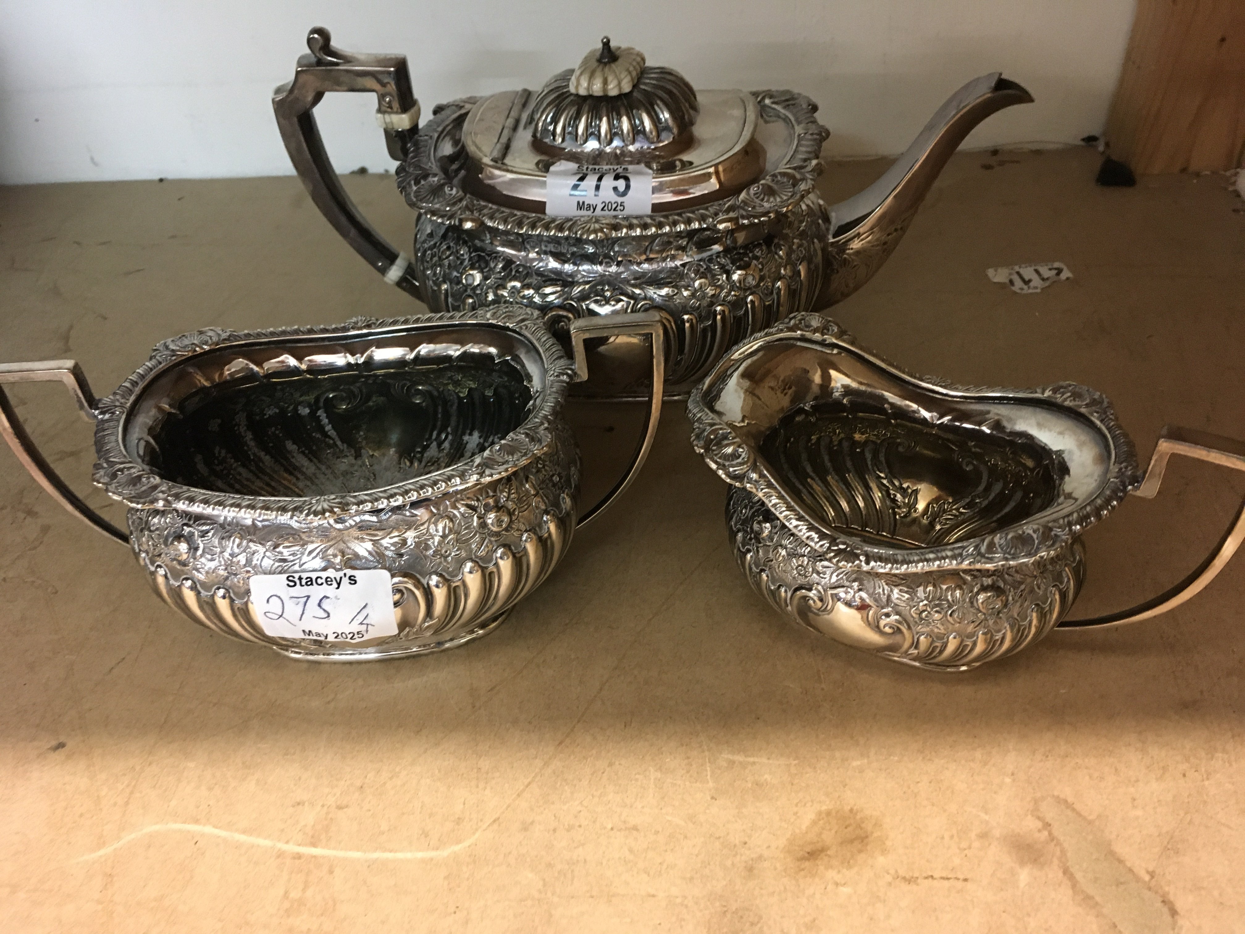 A four piece silver tea set comprising tea pot hot water pot milk jug and sugar bowl 2,3 kilo Sheffield hallmarks.
