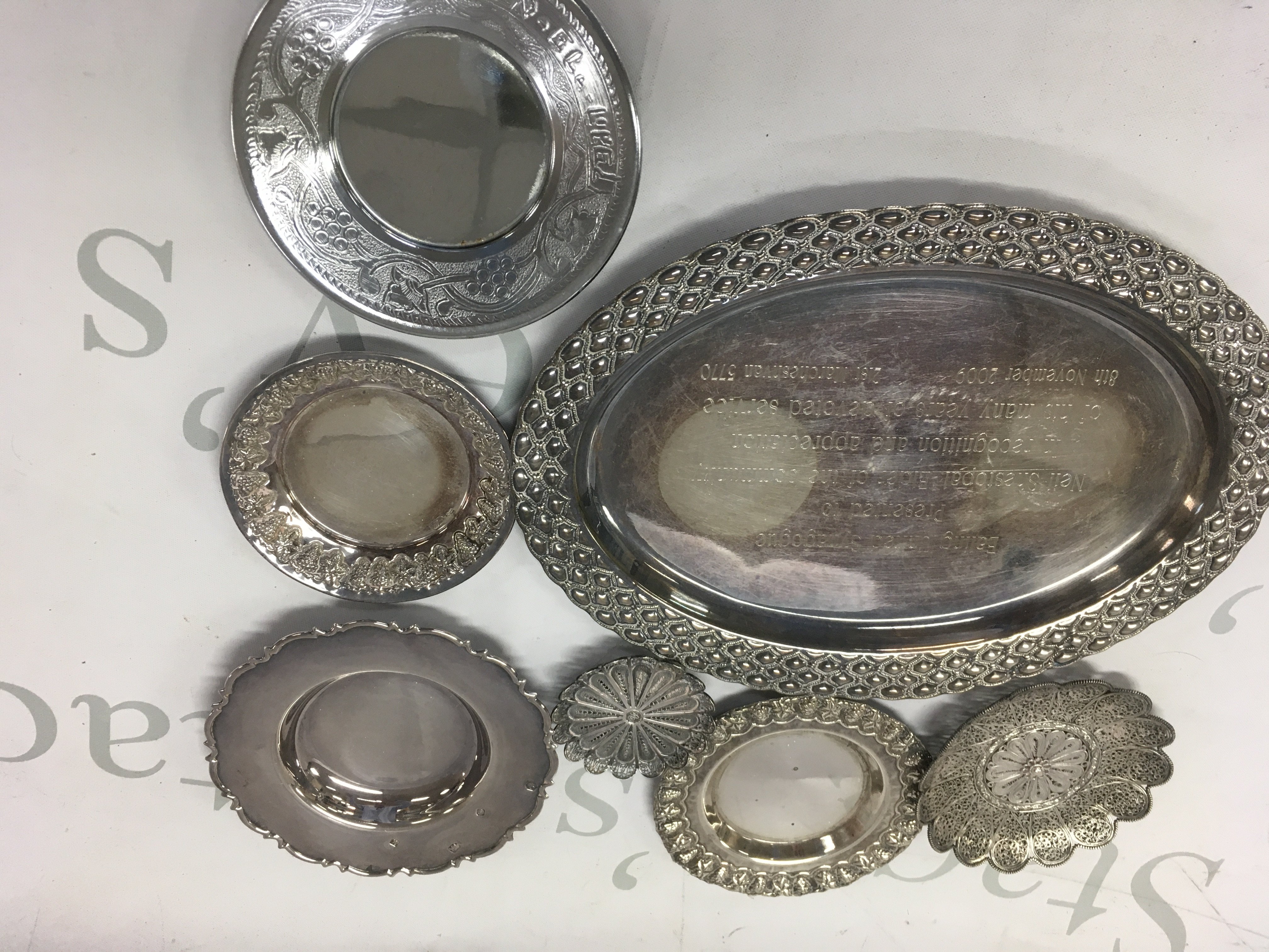 A collection of seven small silver dishes . 442 grams.