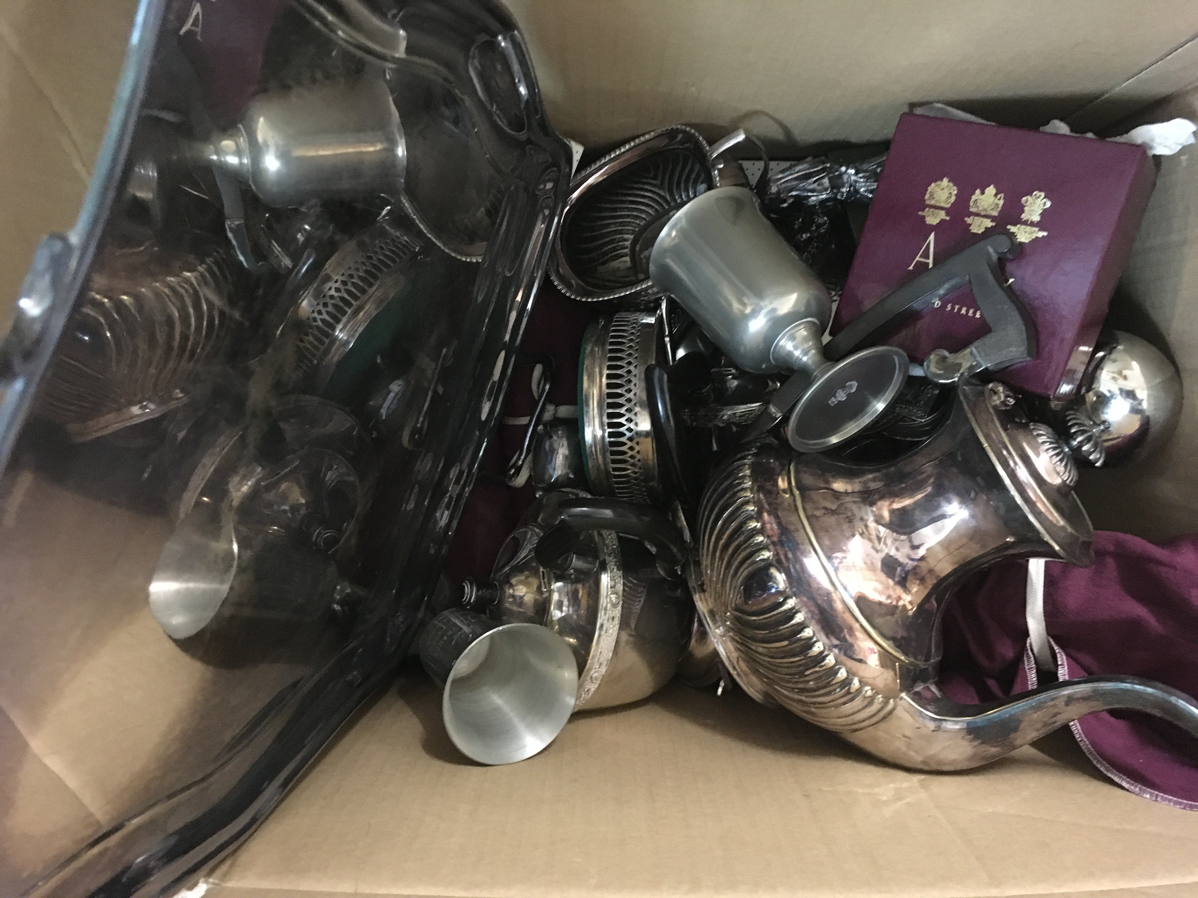 A box of silver plate and cutlery various.