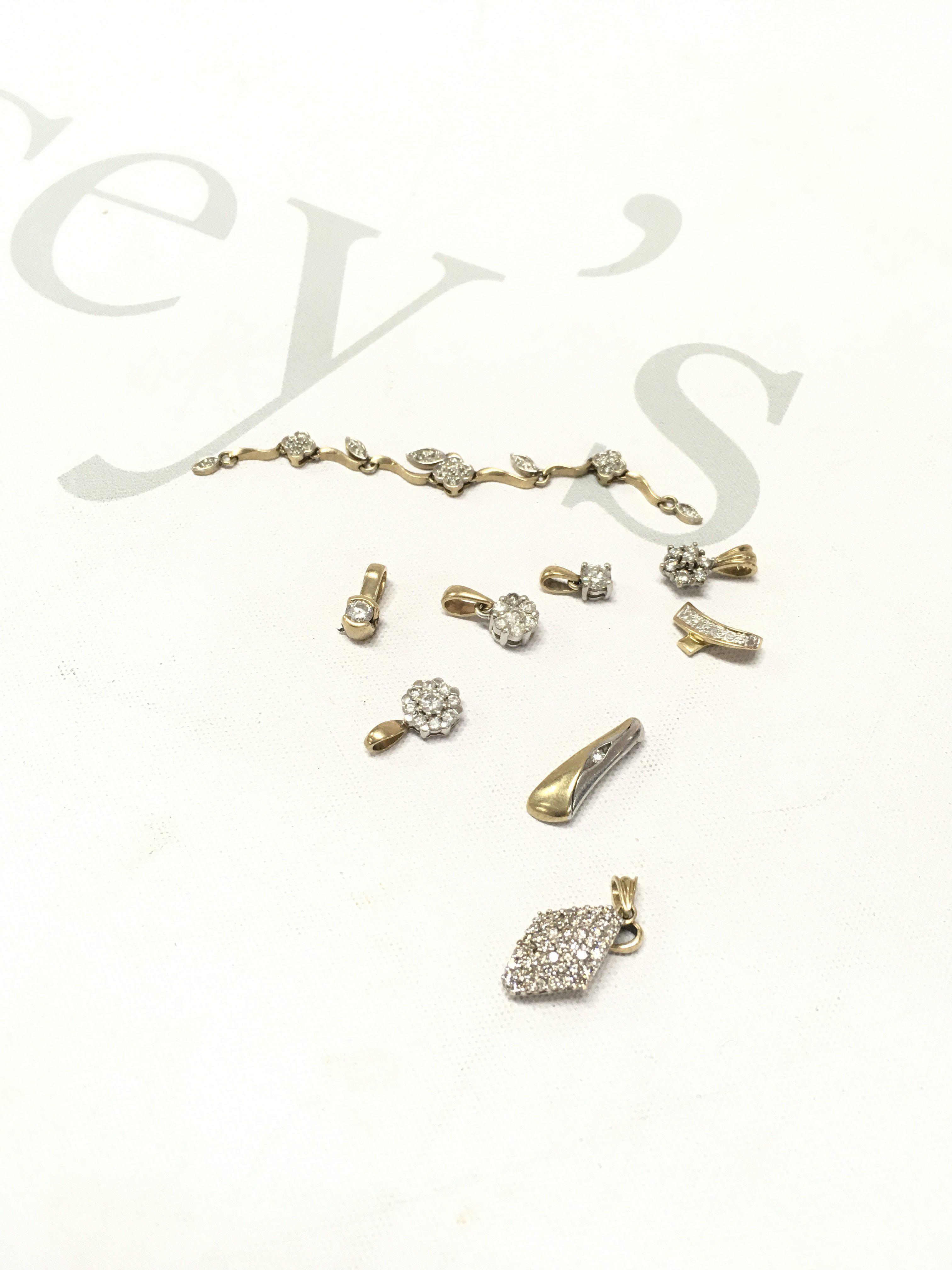 An assortment of 9ct gold stone set pendants. Approx weight 10.0grams.