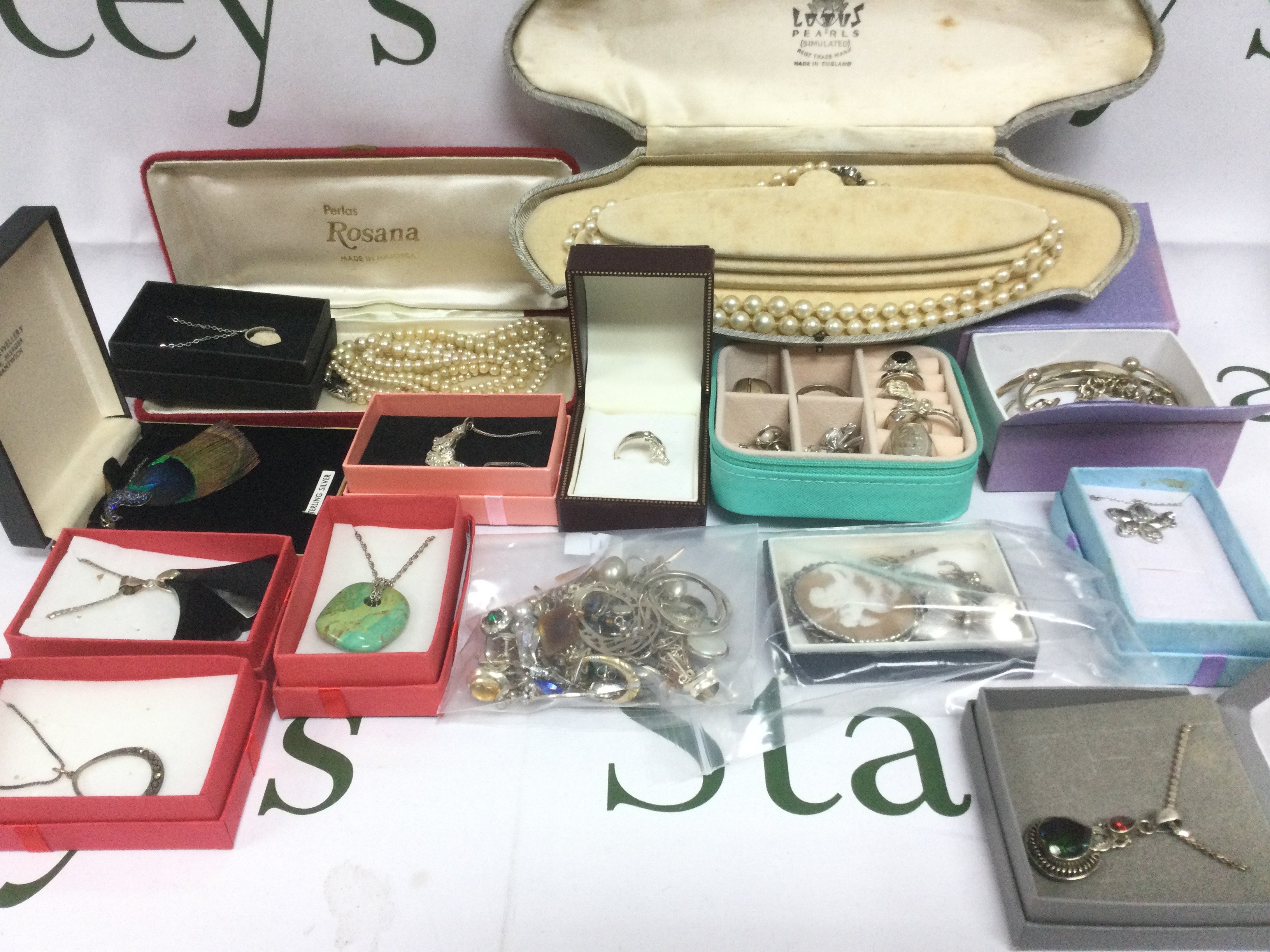 A collection of costume jewellery including some silver. Shipping category B.