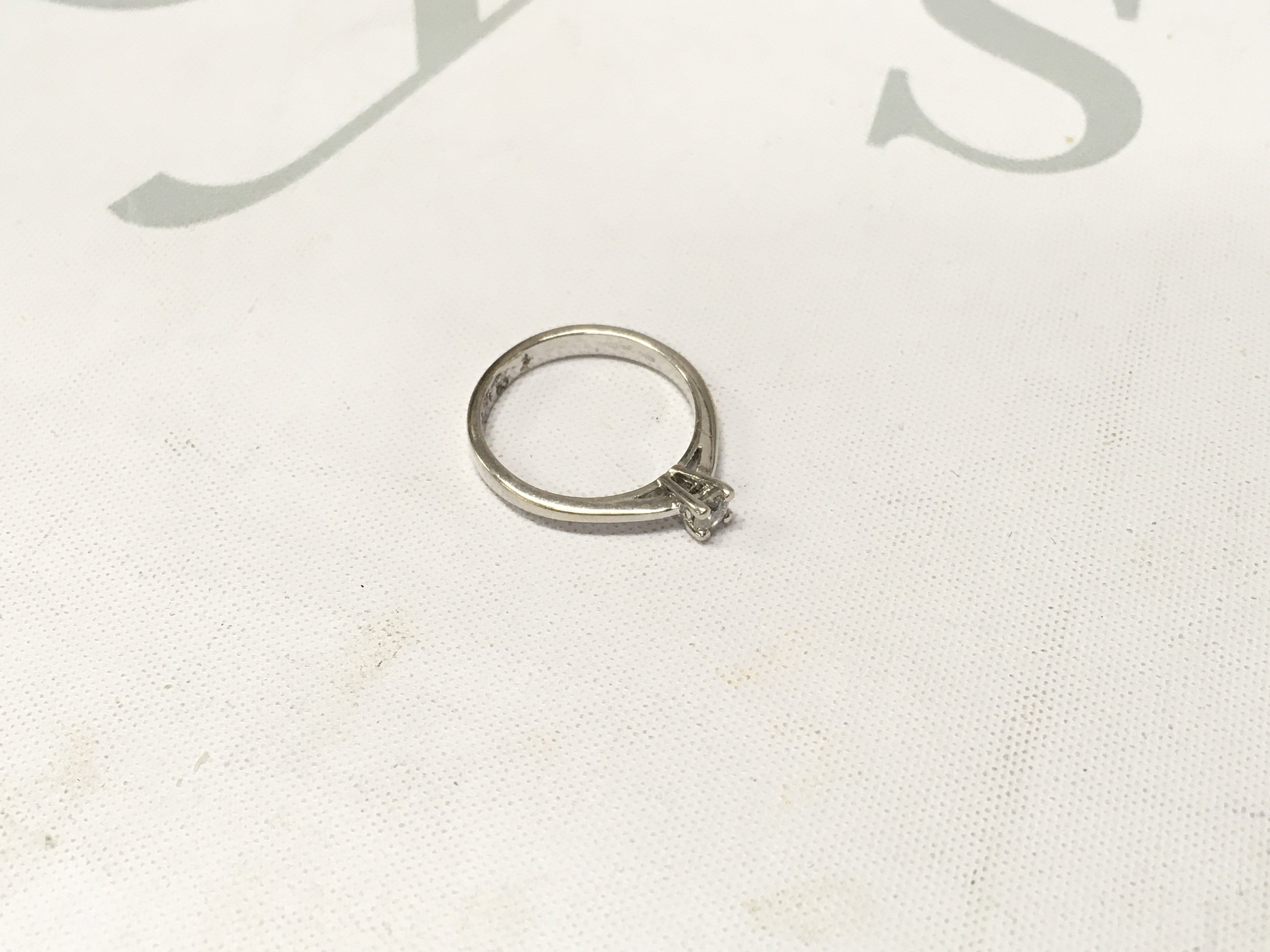 An 18ct white gold solitaire ring, Approx weight 3 grams, Approx size N.