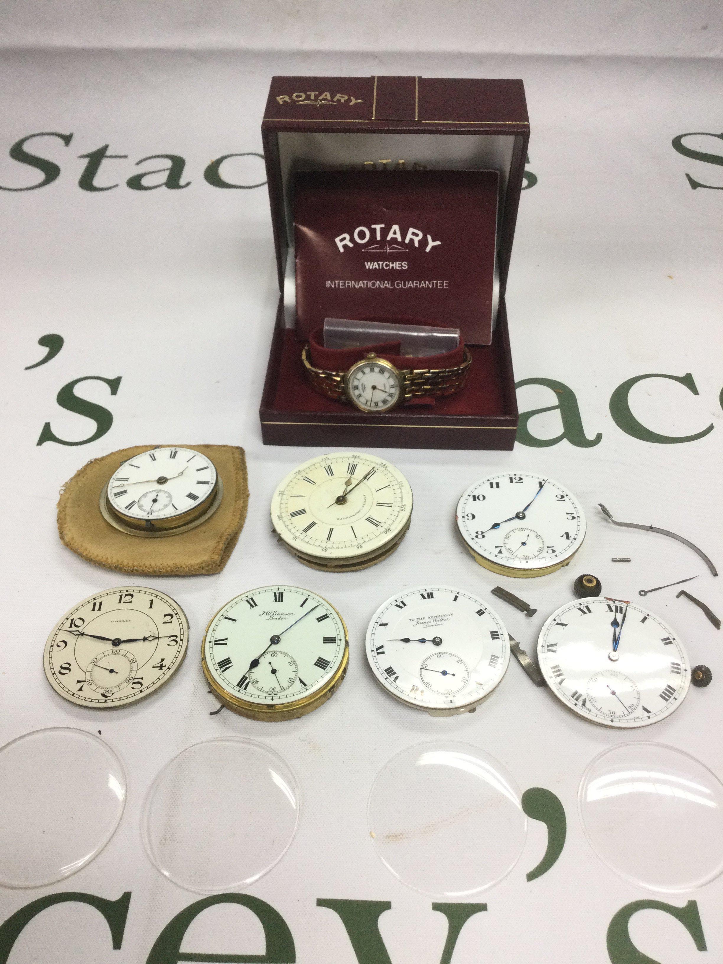 A collection of watch parts and a boxed ladies Rotary watch. Shipping category D.