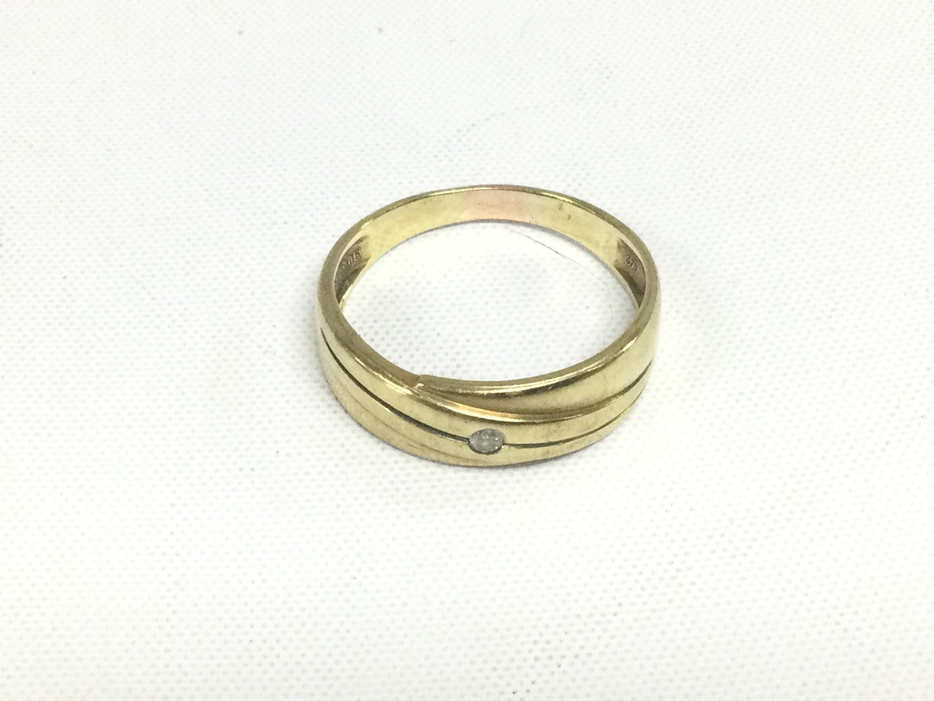 A 9ct gold diamond solitaire ring, approx 3.7g and approx size X. Shipping category A.