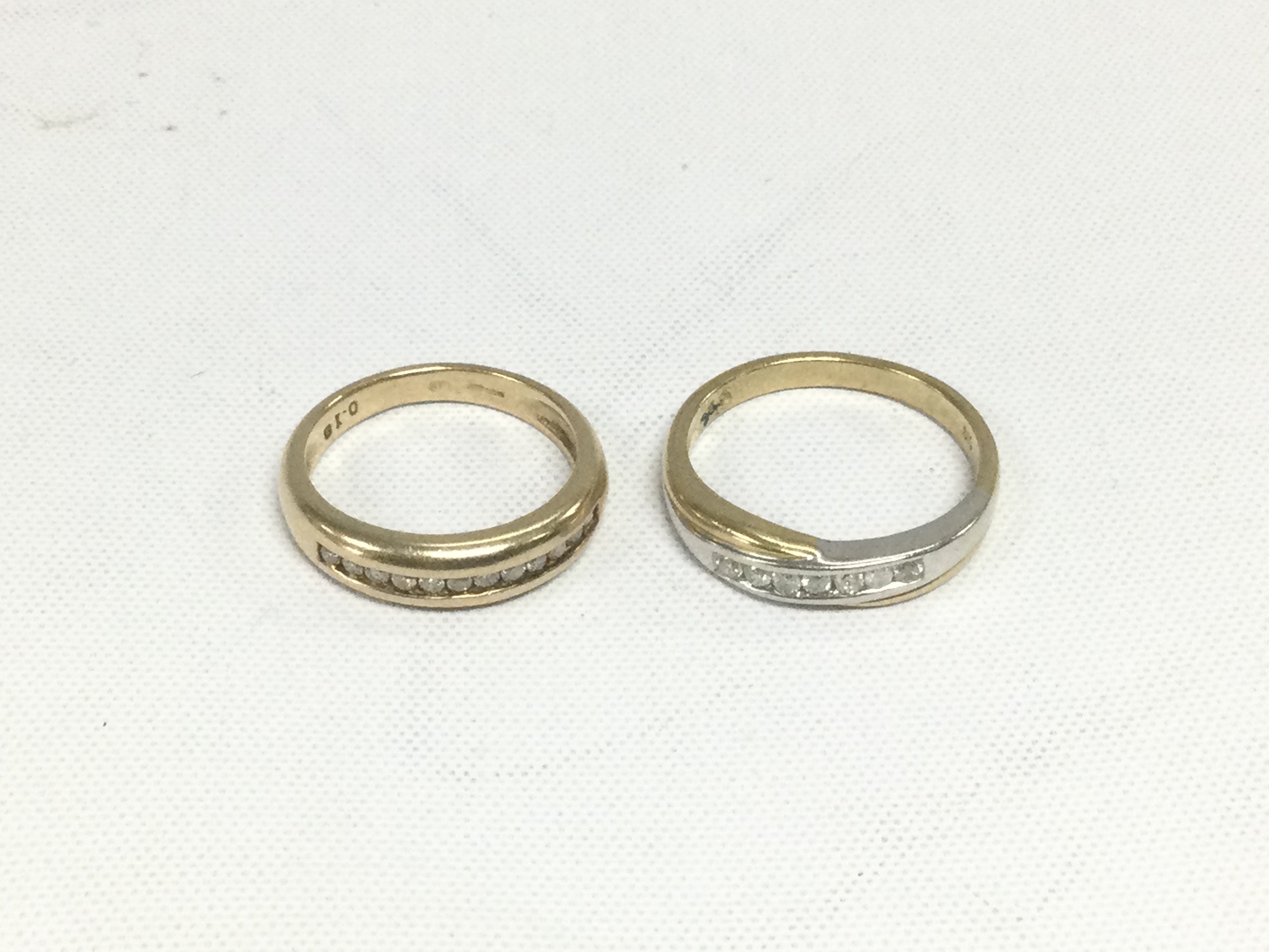 Two 9ct gold half eternity rings, total approx 5.3g and approx sizes K and O. Shipping category A.