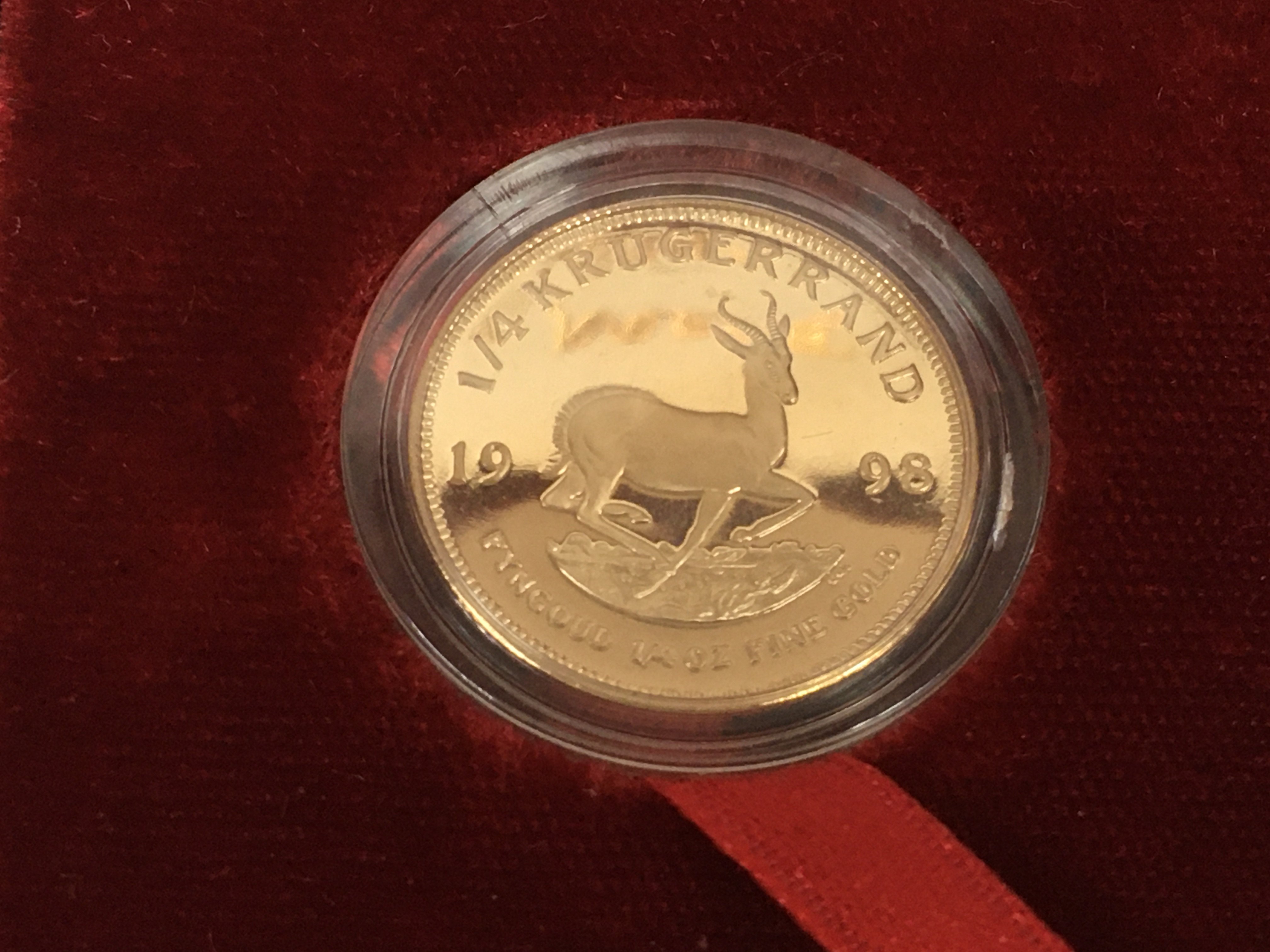 A 1998 1/4oz Krugerrand with COAPostage B
