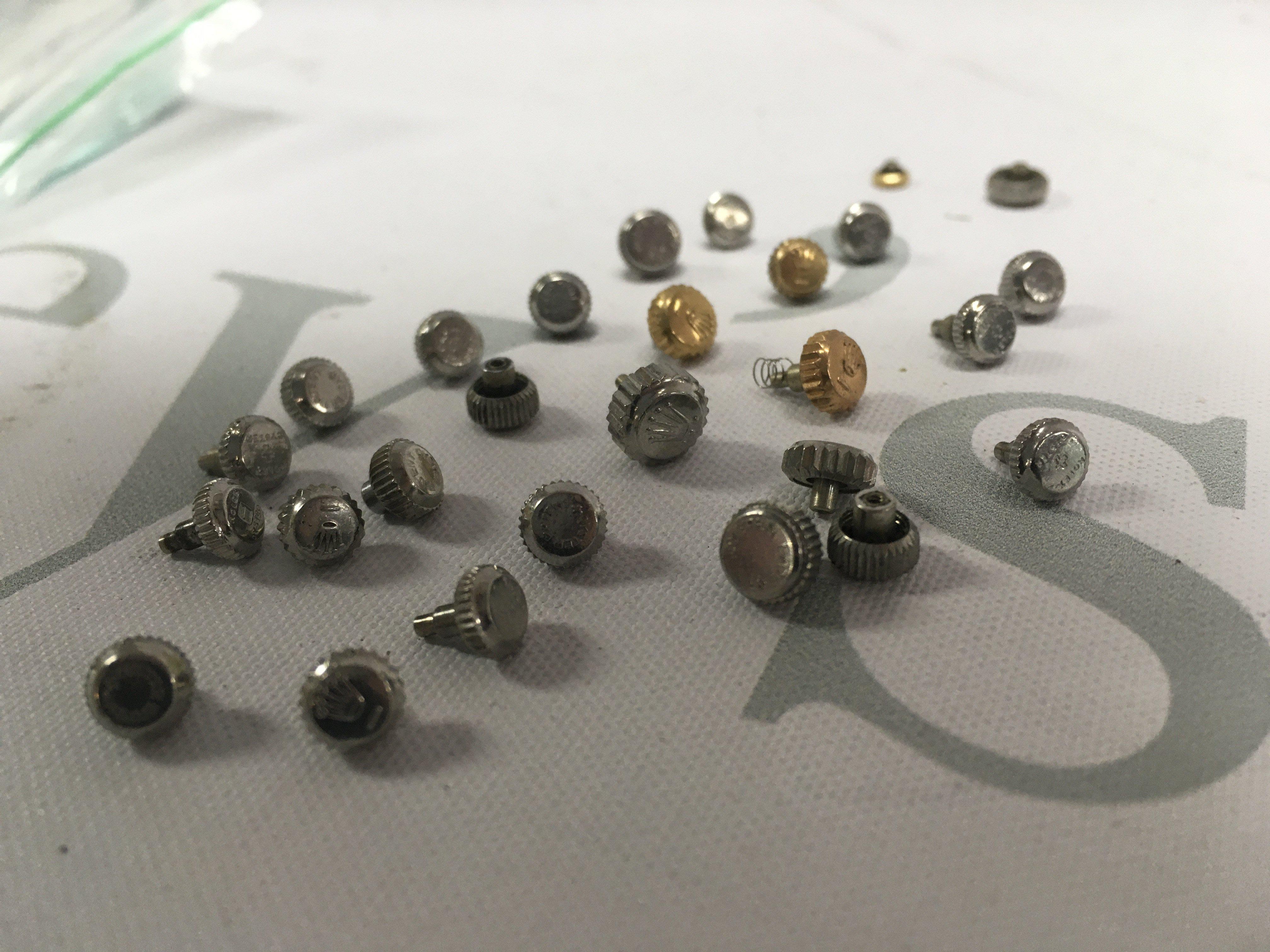 A collection of watch winders including Rolex .