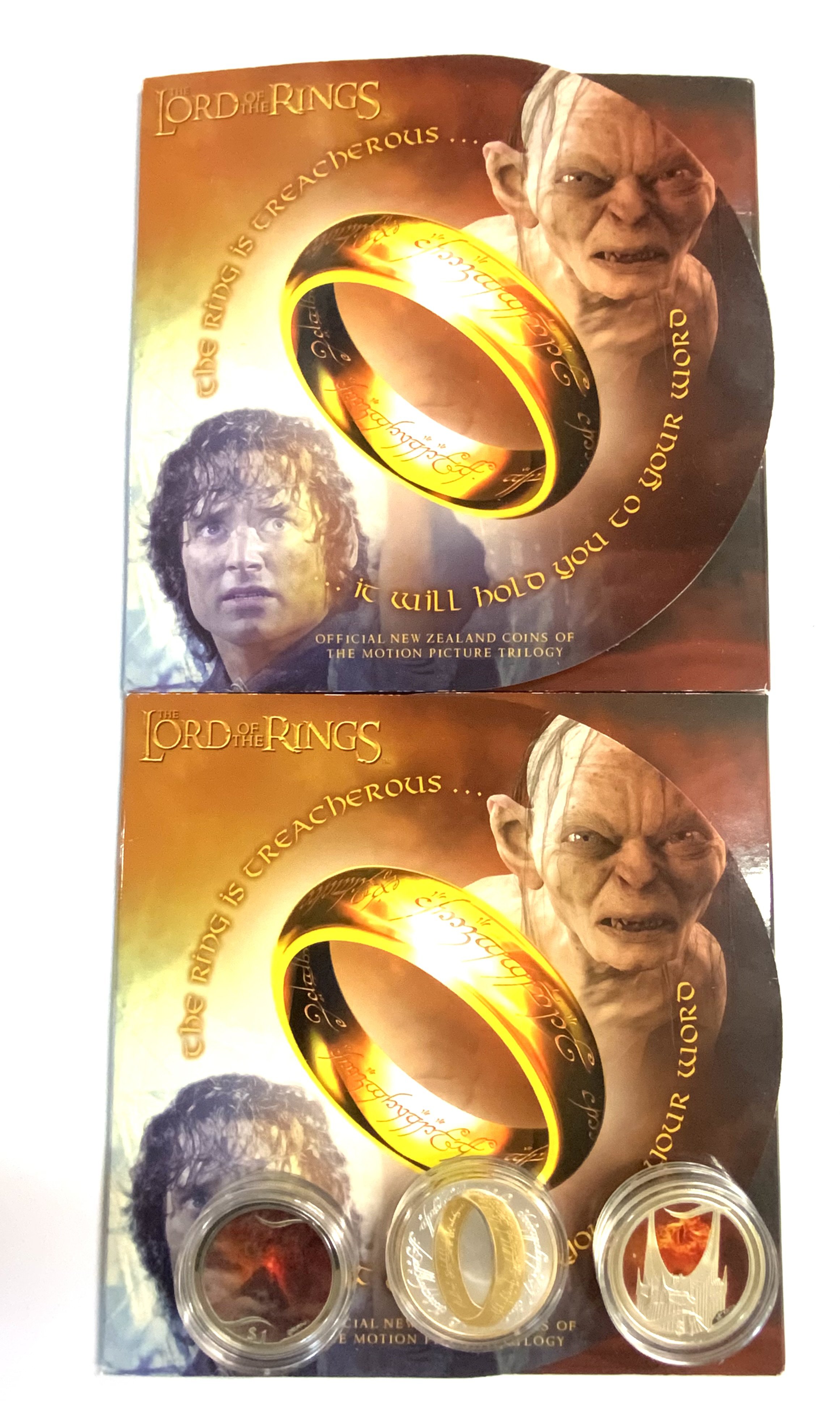 2 Lord of The rings coin sets together with 3 New Zealand Mint issue sterling silver coins. (A)