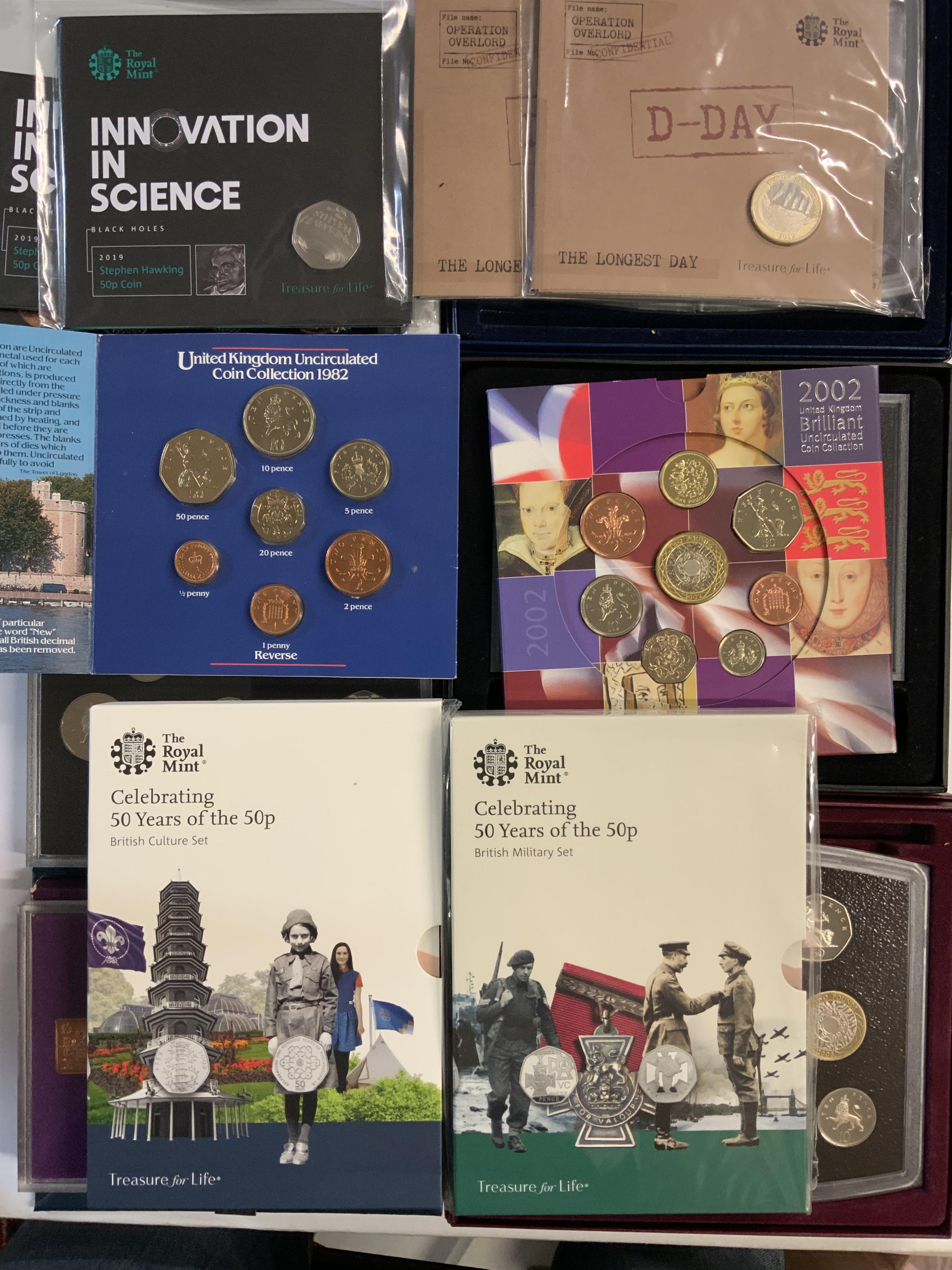 A mixed collection of Royal mint uncirculated coin presentation sets.