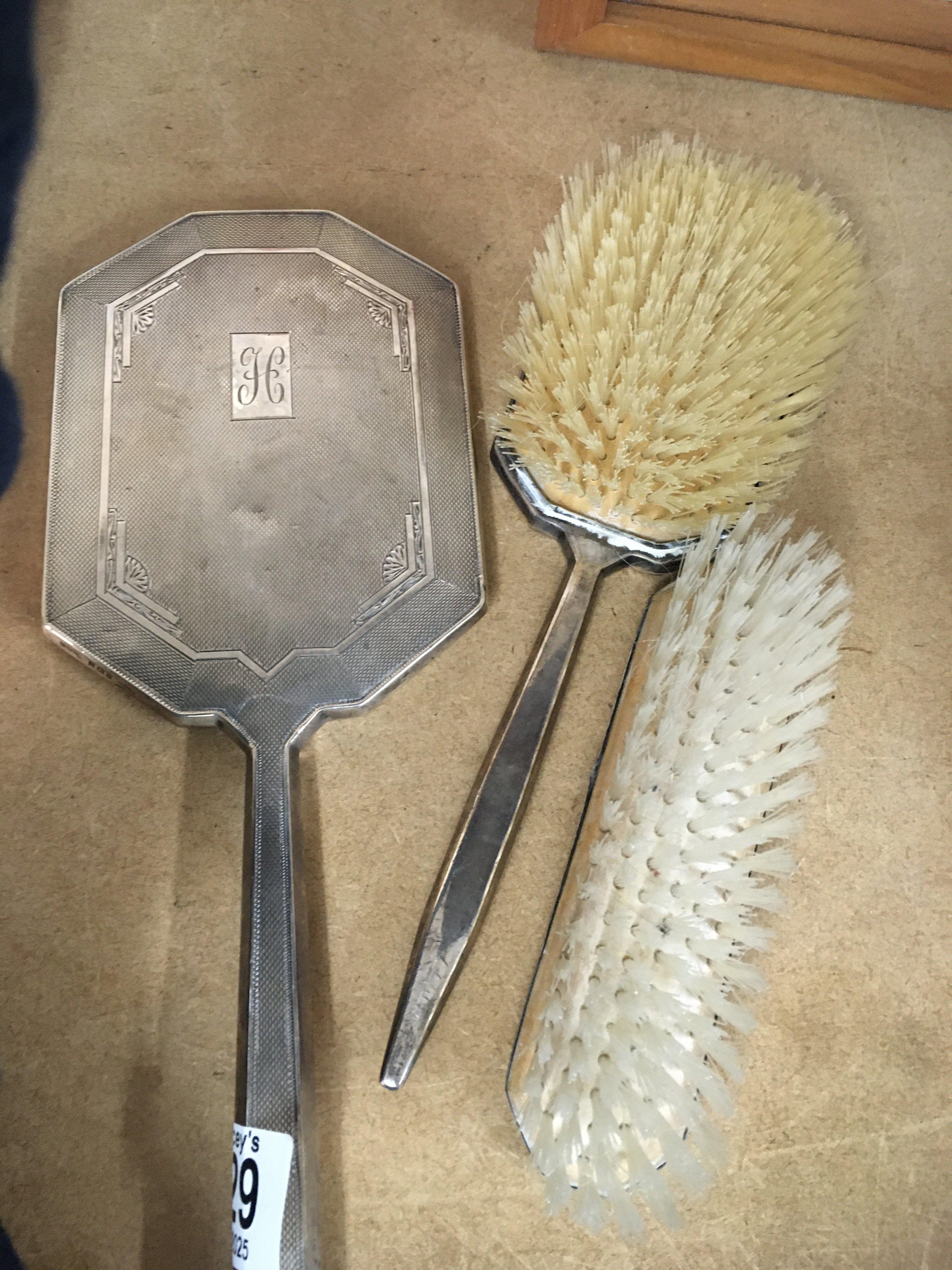 A 1920s silver hair brushes and hand mirror