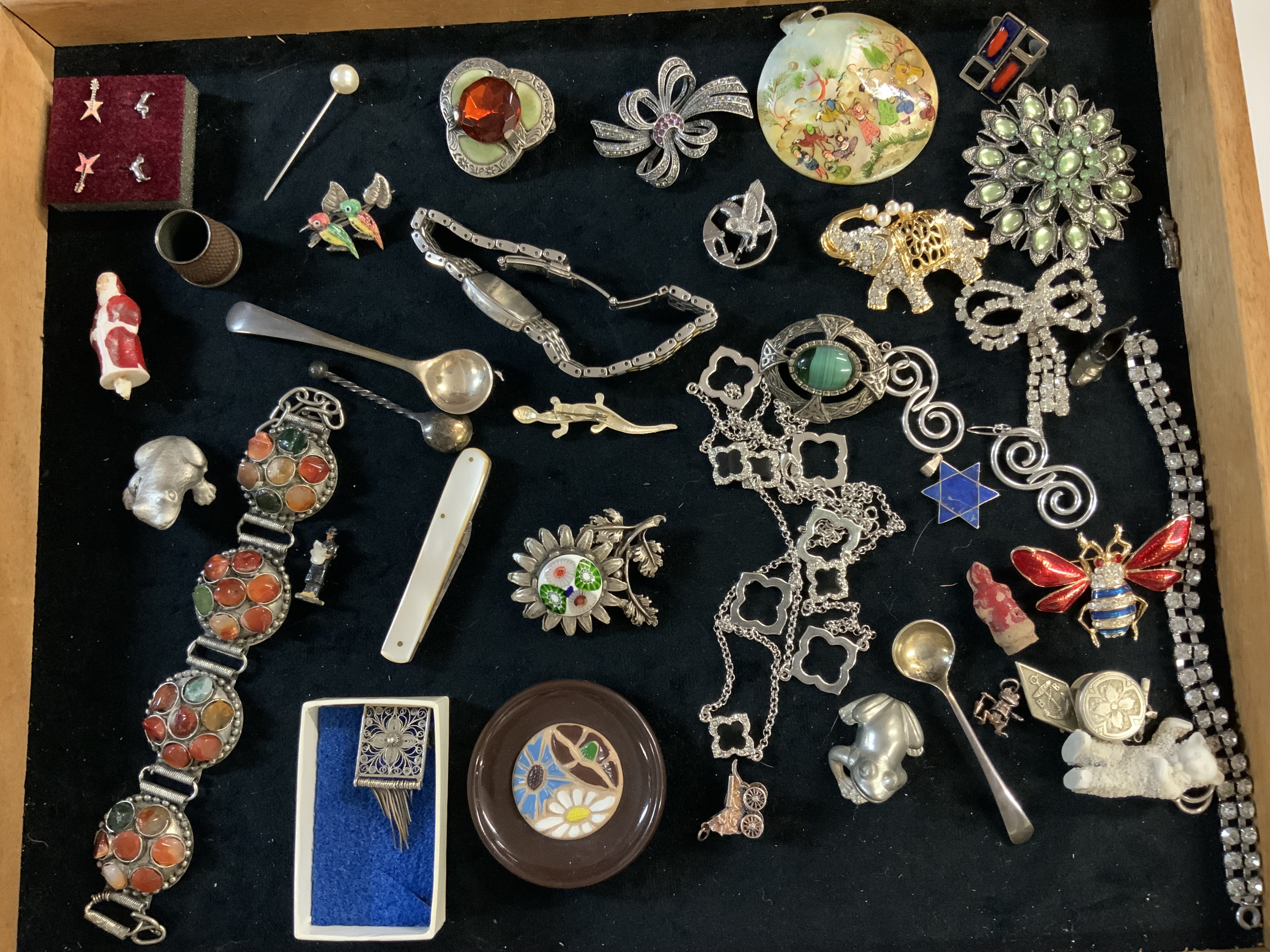 A display case and jewellery contents.