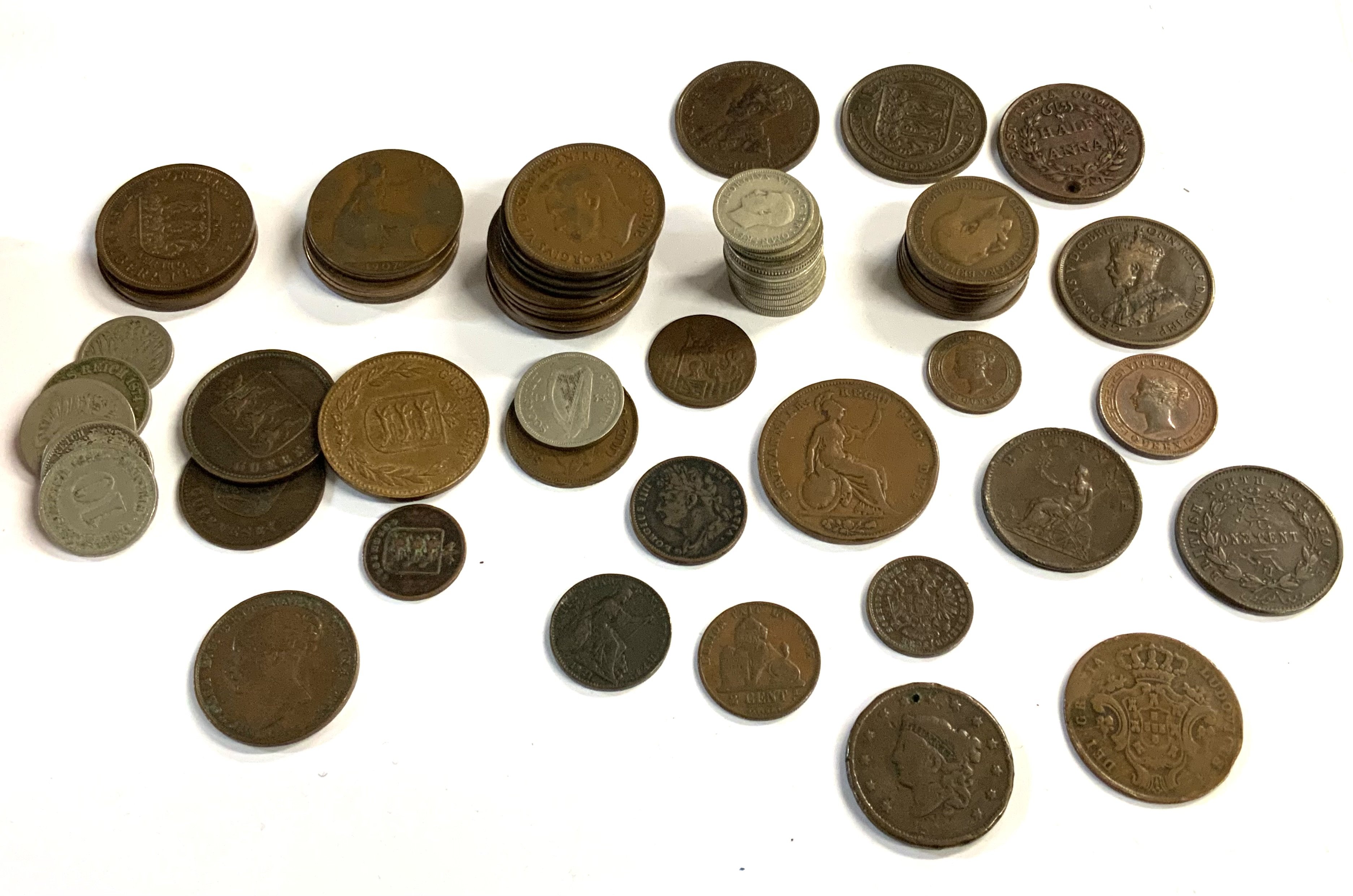 A small collection of good copper coinage including a cased silver medallion.