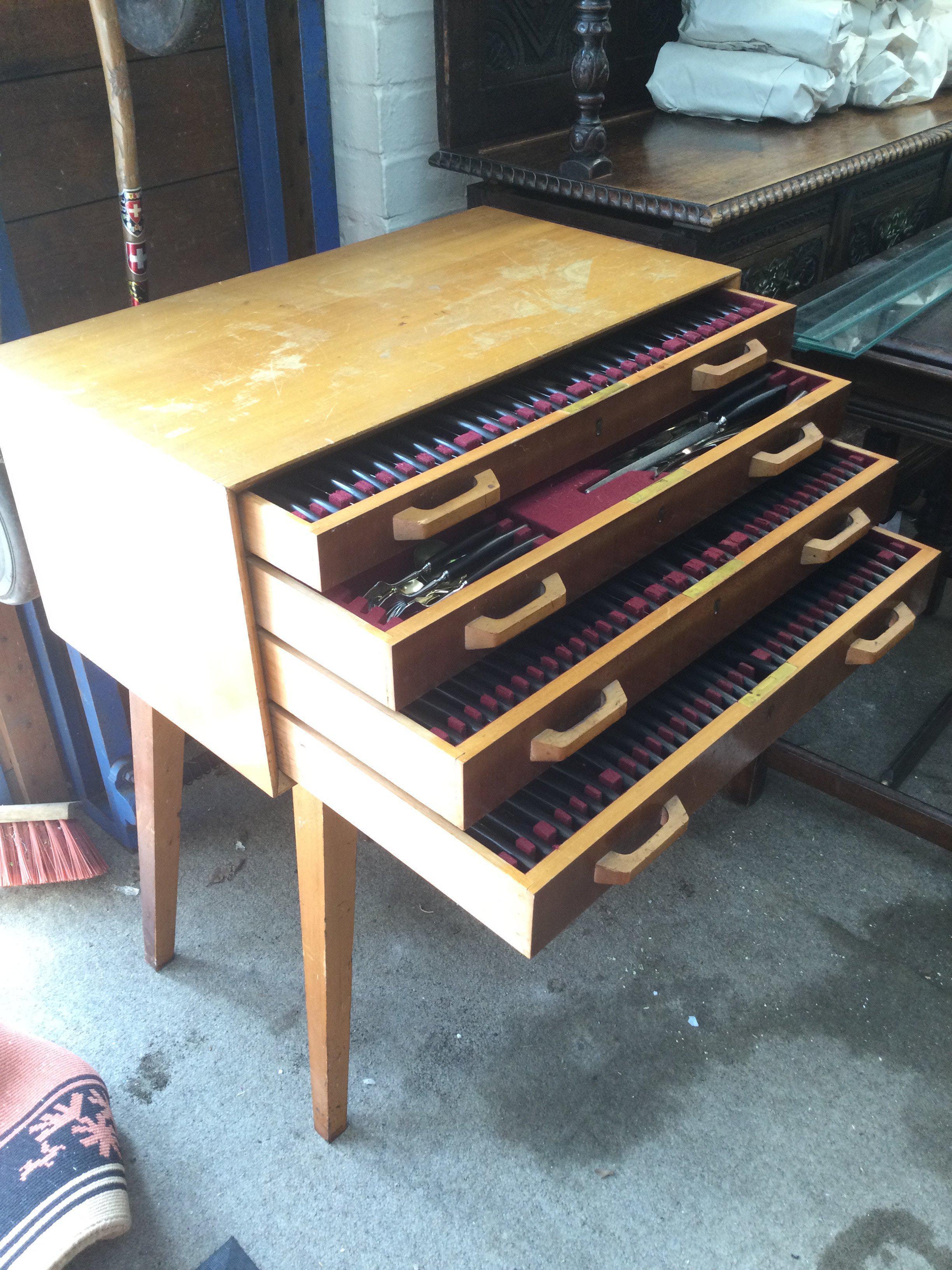 A freestanding Grenadilla canteen of cutlery. Shipping category D.