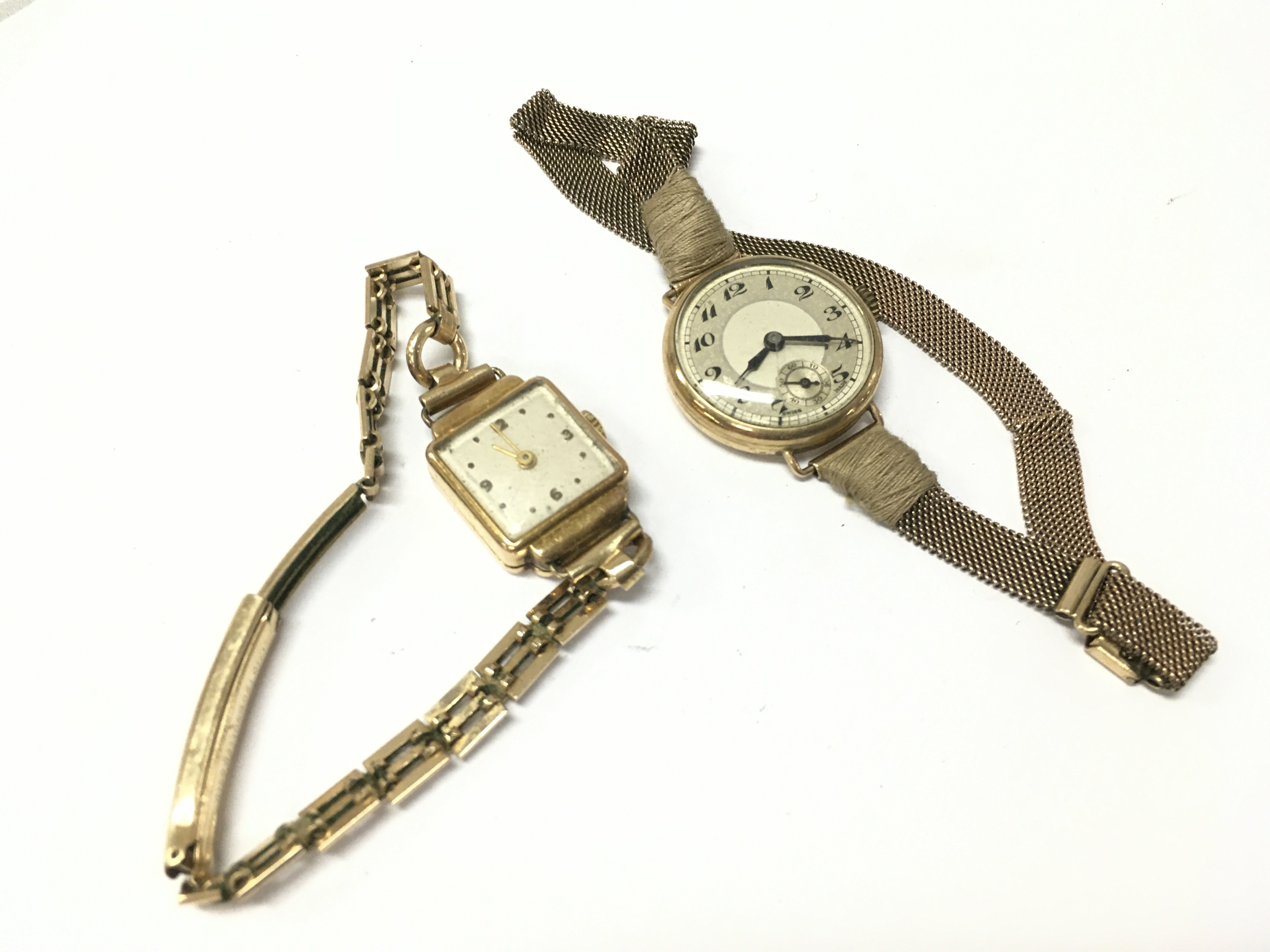 An 18ct gold cased watch with a 12ct rolled gold strap and a 9ct gold cased watch with a 9ct gold strap. Total weight 31.8g Postage category A