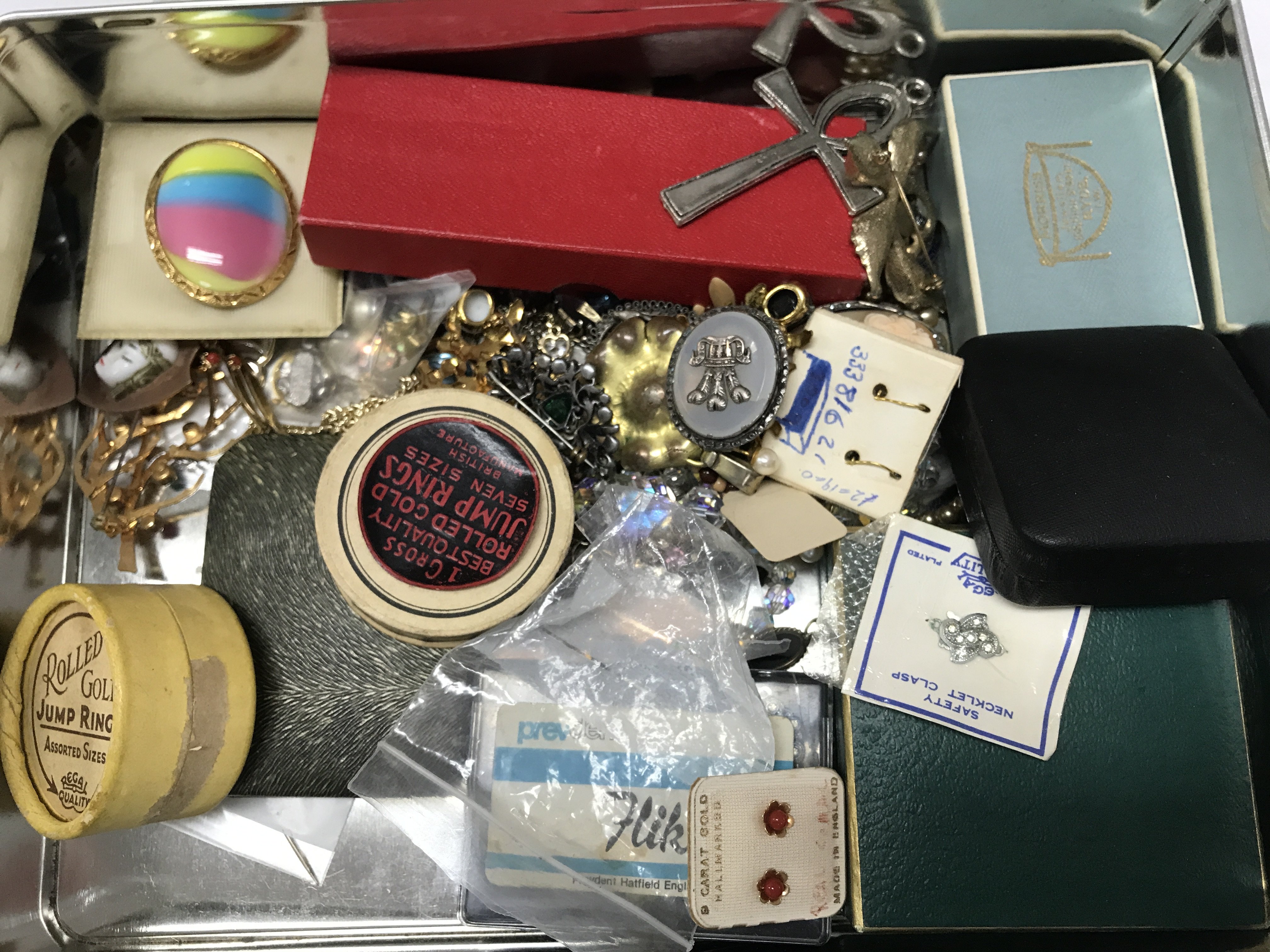 A Collection of costume jewellery including a silver bracelet, 9 ct gold coral earrings, necklaces, brooches etc . Postage category B