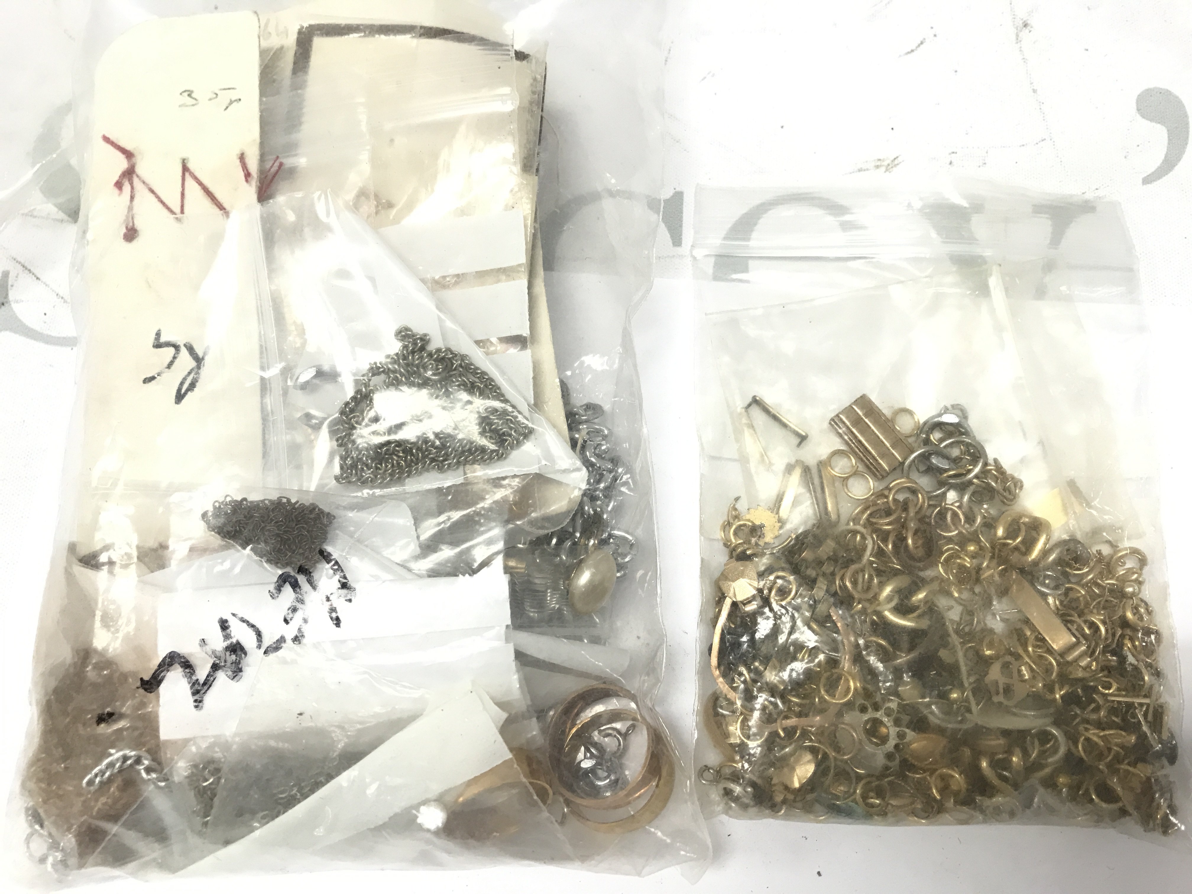 A collection of gold tone jewellery , links, chains etc. postage category B