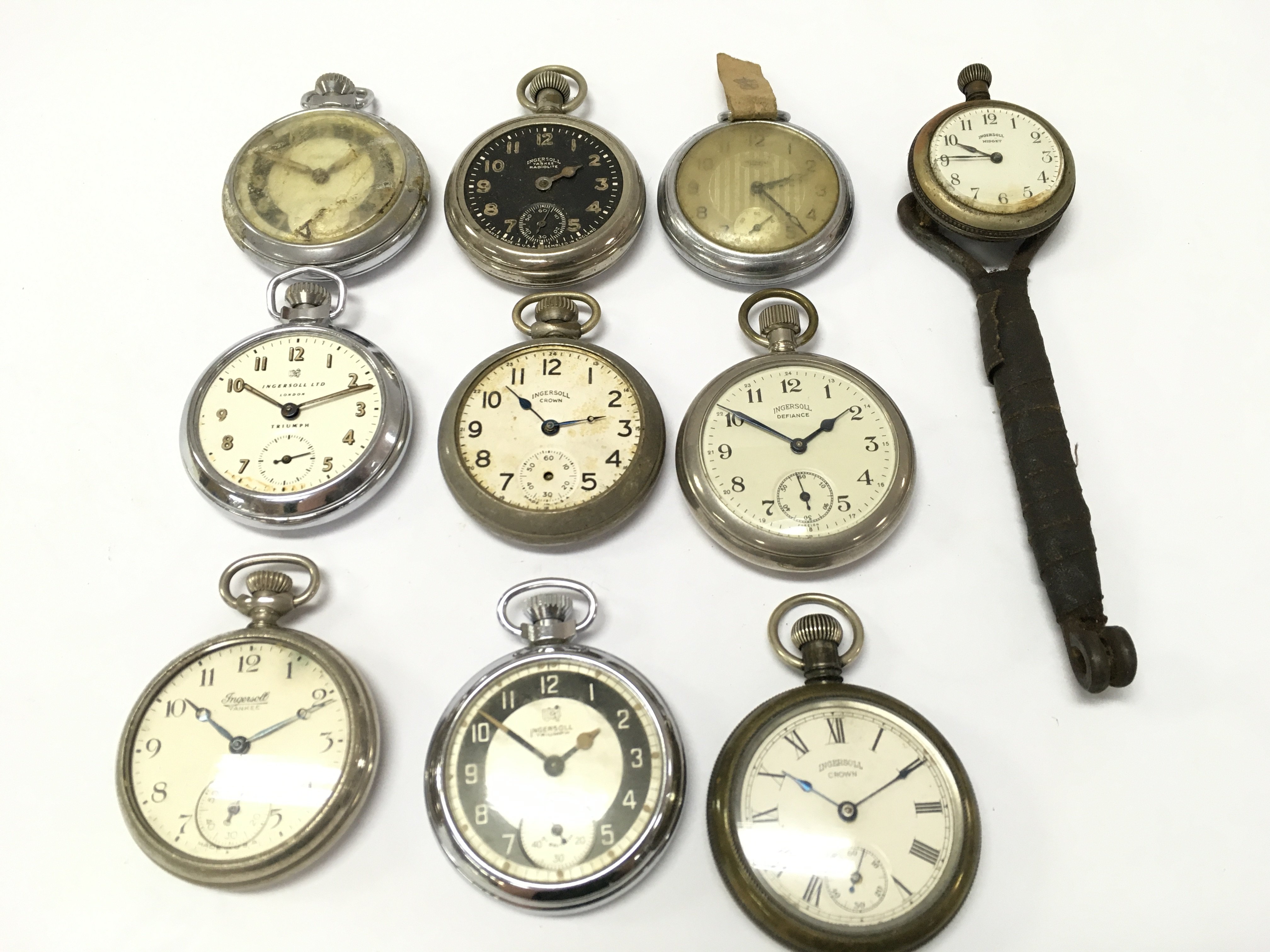 A collection of early Ingersoll pocket watches . Postage category B