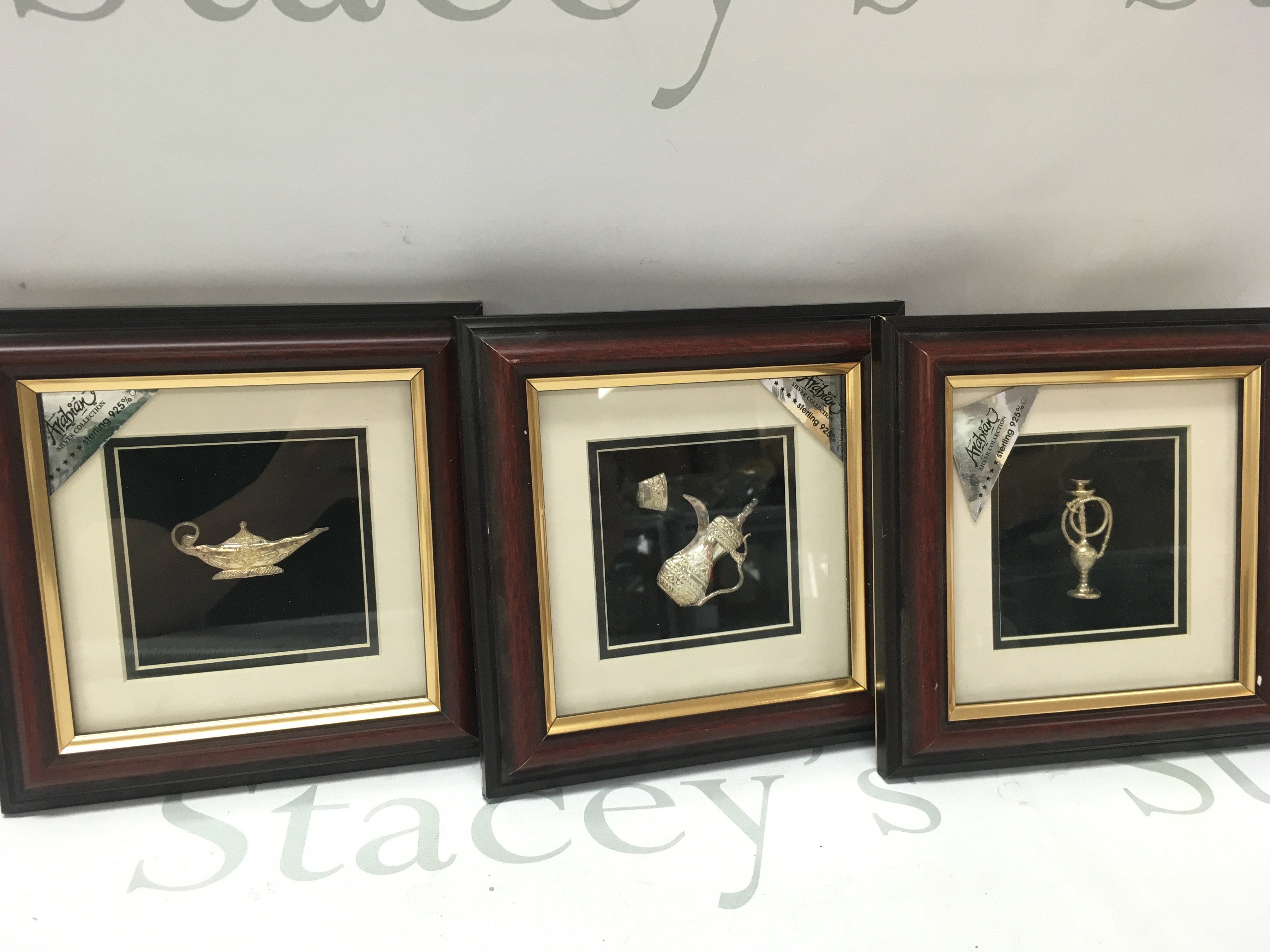 Three framed Sterling Silver 925 Arabian Miniature Sculptures. This lot cannot be posted