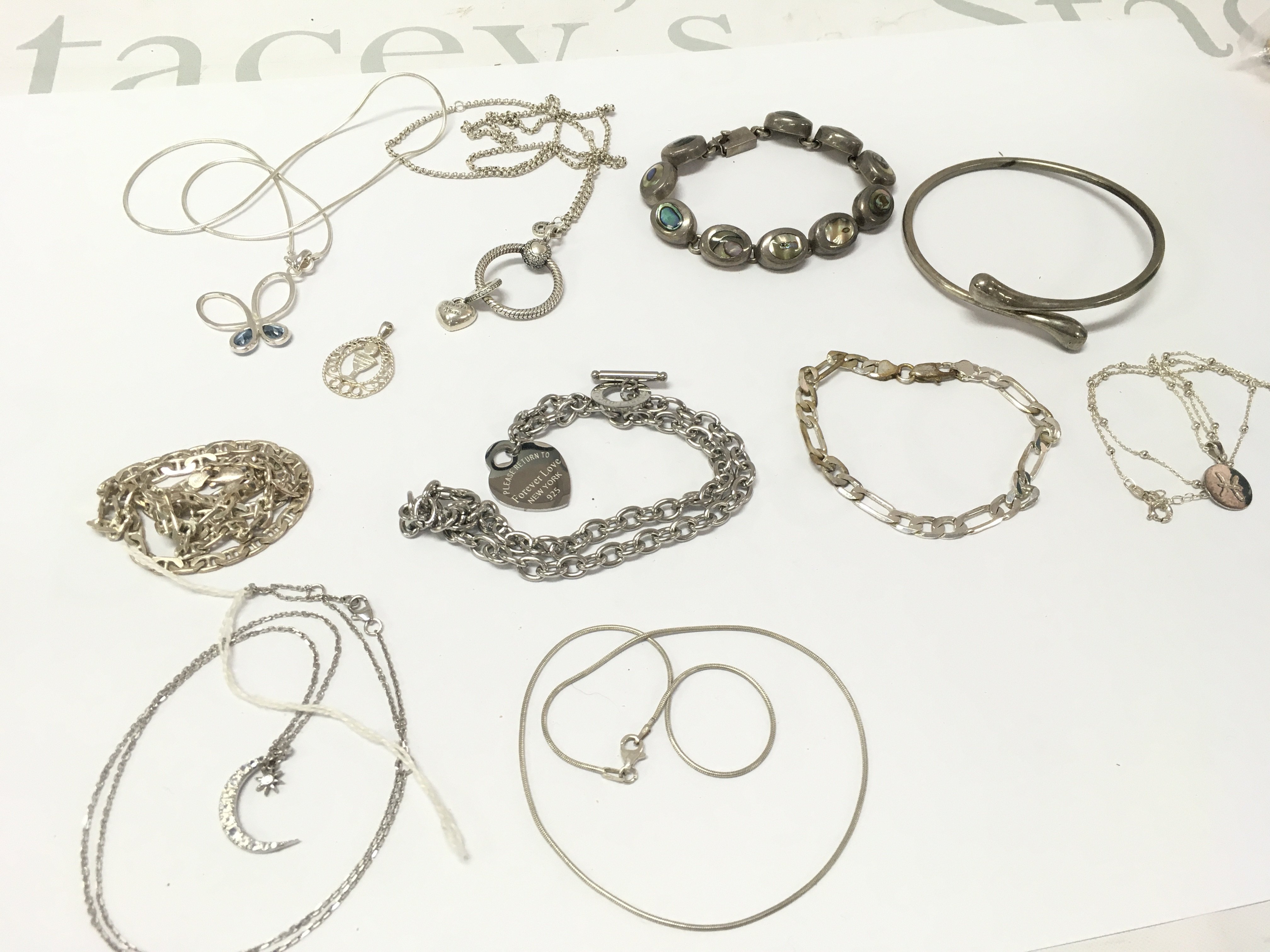 A collection of silver Jewellery including necklaces, bracelets. Postage category A