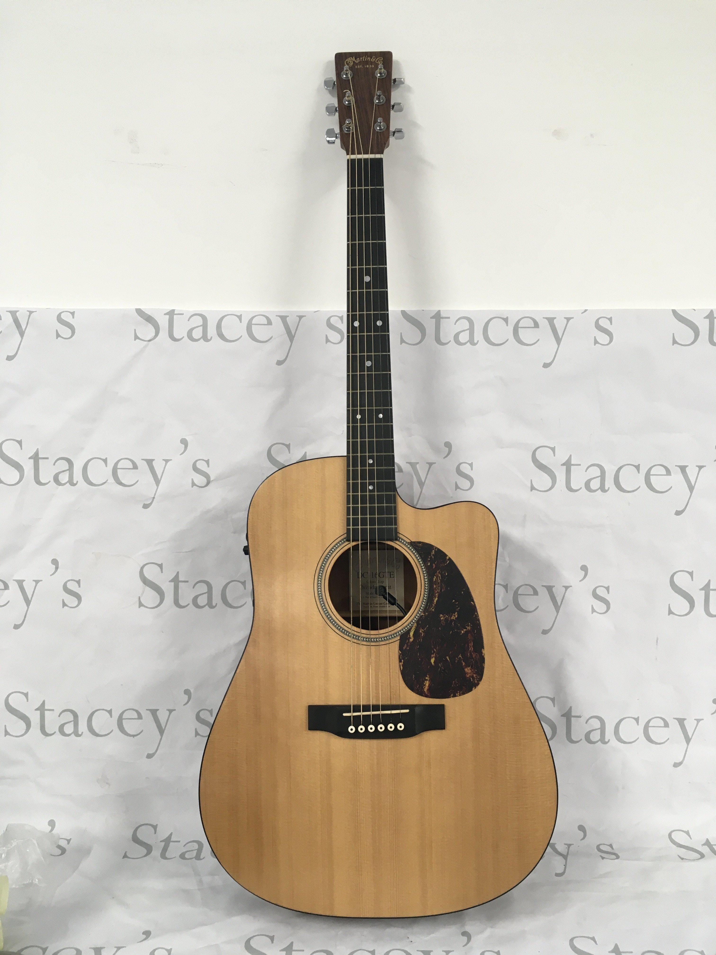 A Martin DC-16GTE electro acoustic guitar in as new condition. Comes with original Martin branded hard carry case.
