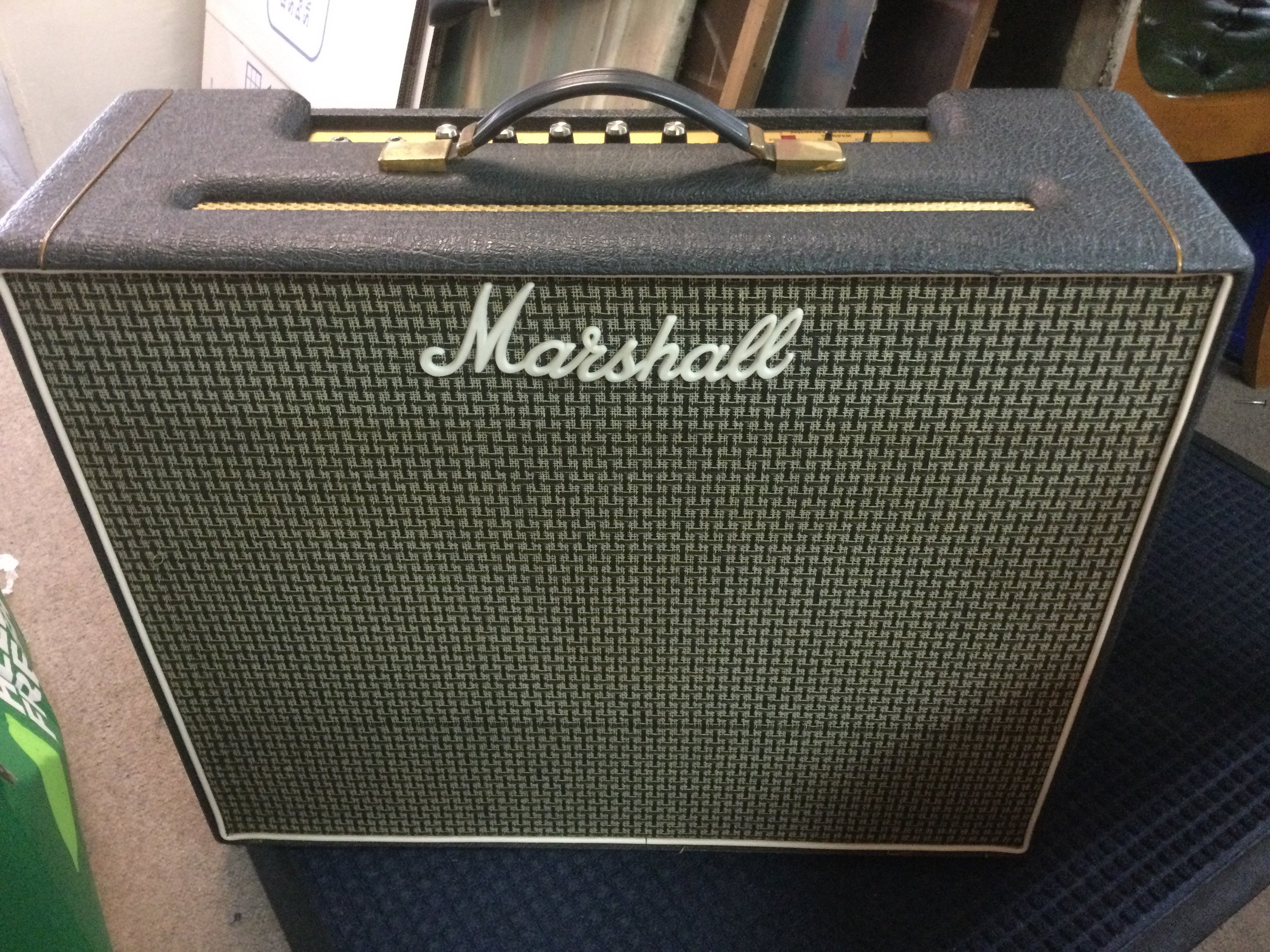 A rare 1975 Marshall JMP lead and bass combo amplifier fitted with 2x12" speakers. Originally only available as a mail order only item this is now a classic Marshall rarity. Comes with amp cover and power lead.
