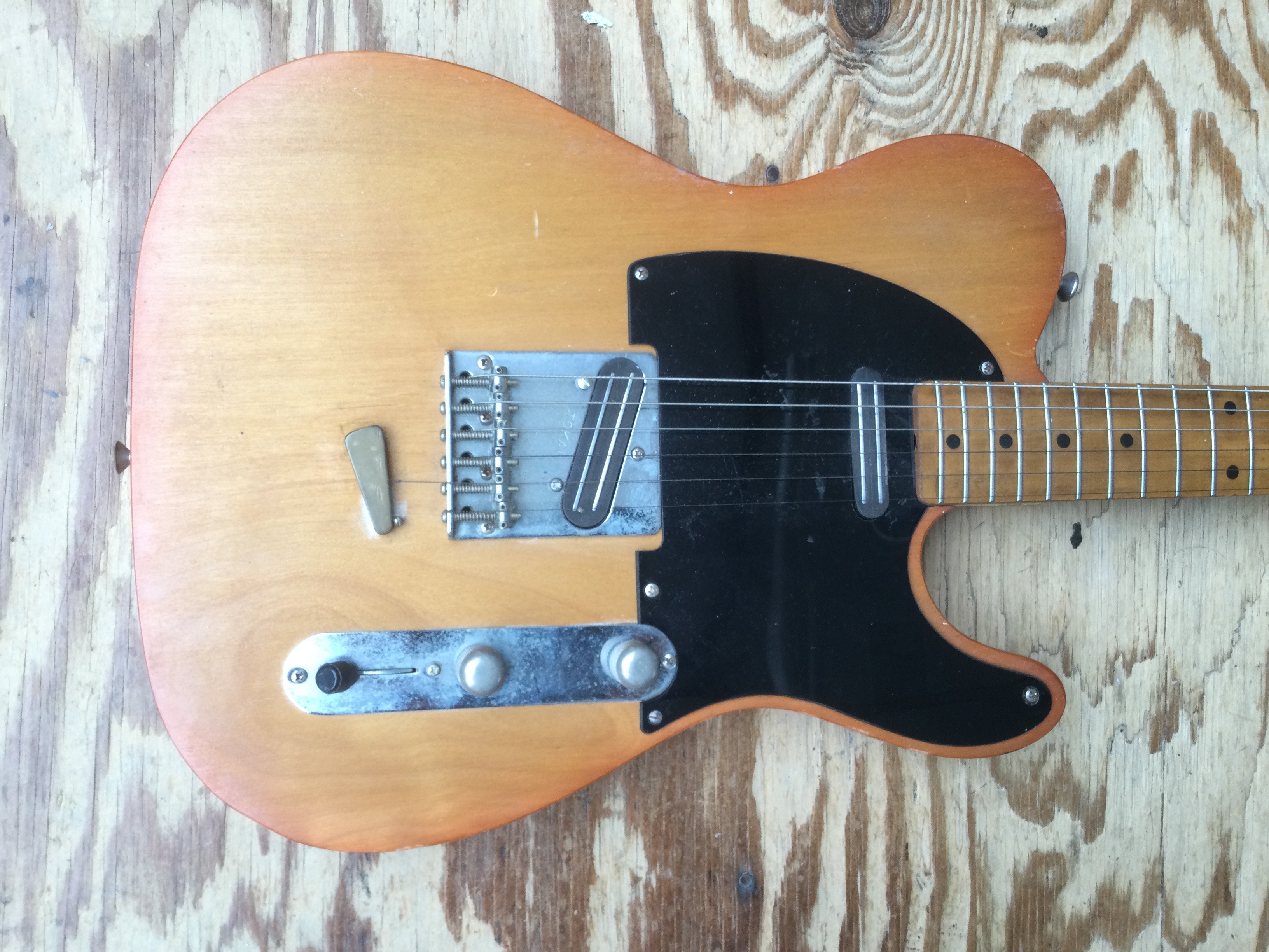 A Tokai breezysound Tele style electric guitar. Has been modified and fitted with Joe Barden pickups (not wired in) and Grover tuners. The original factory pickups are also included in this lot. No case.